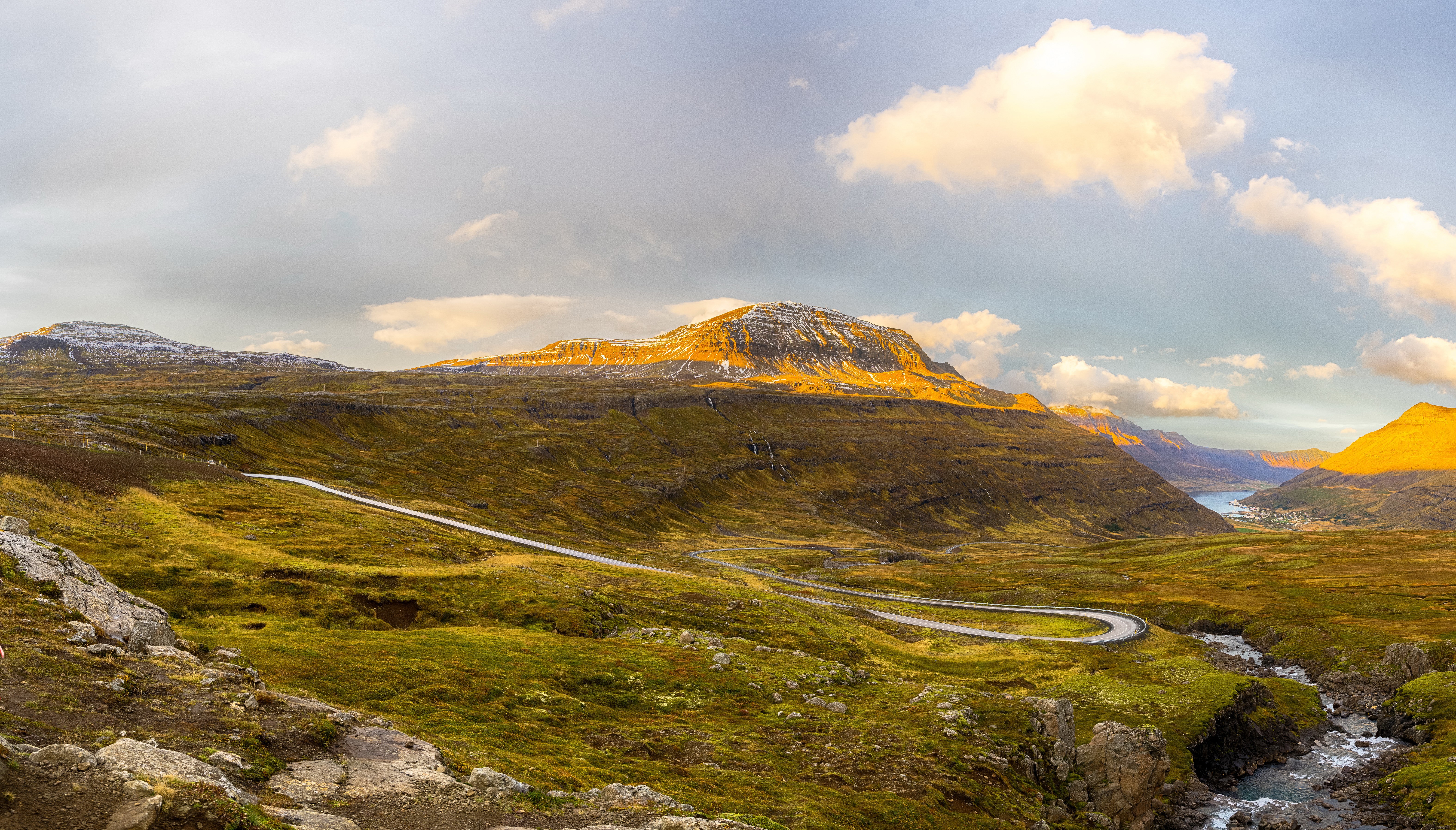 Roads winding through hills in Sudur-Mulasysla, Iceland HD Wallpaper