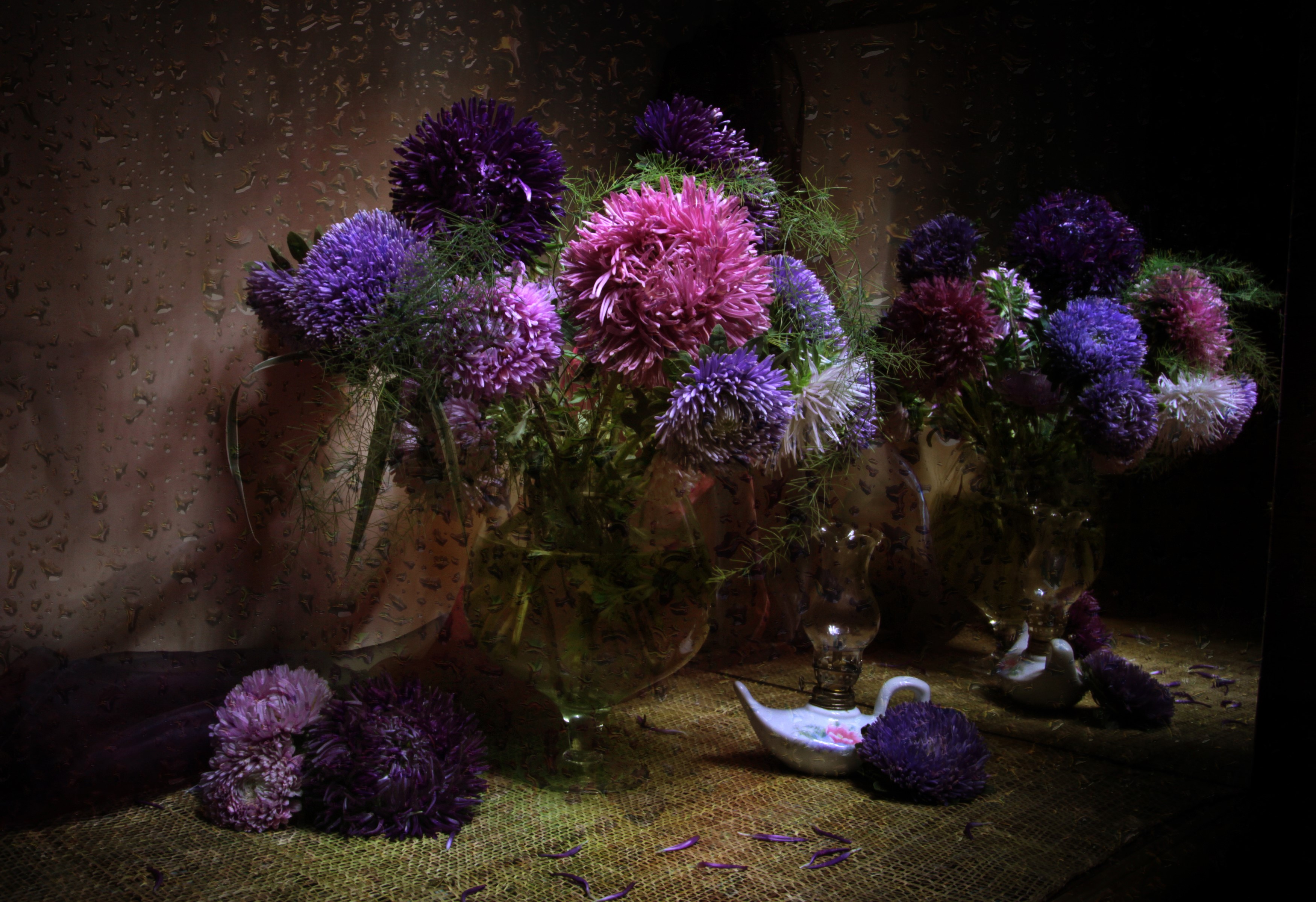 Asters in vases with a small oil lamp HD Wallpaper