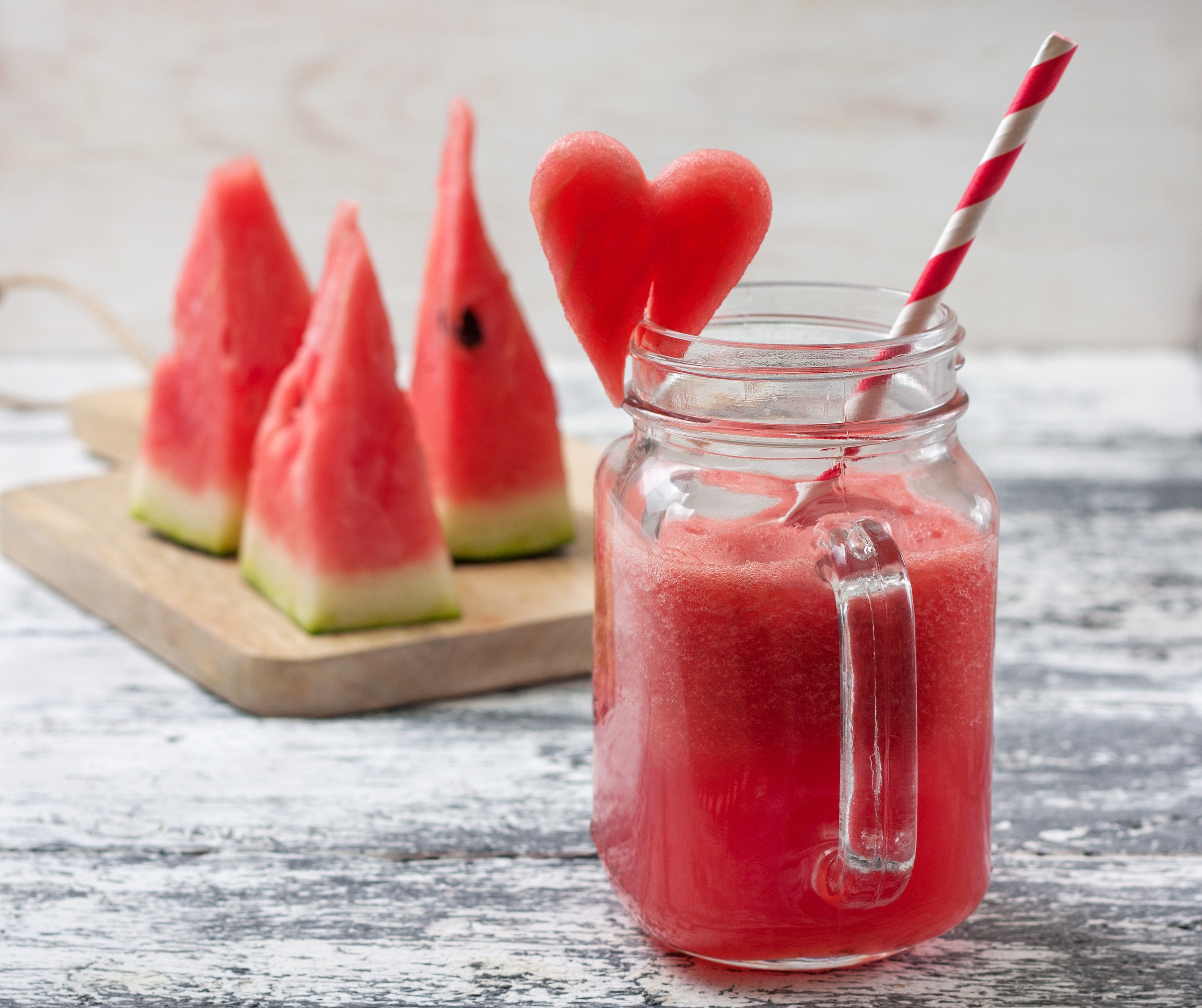 Watermelon juice in a mug with watermelon slices HD Wallpaper