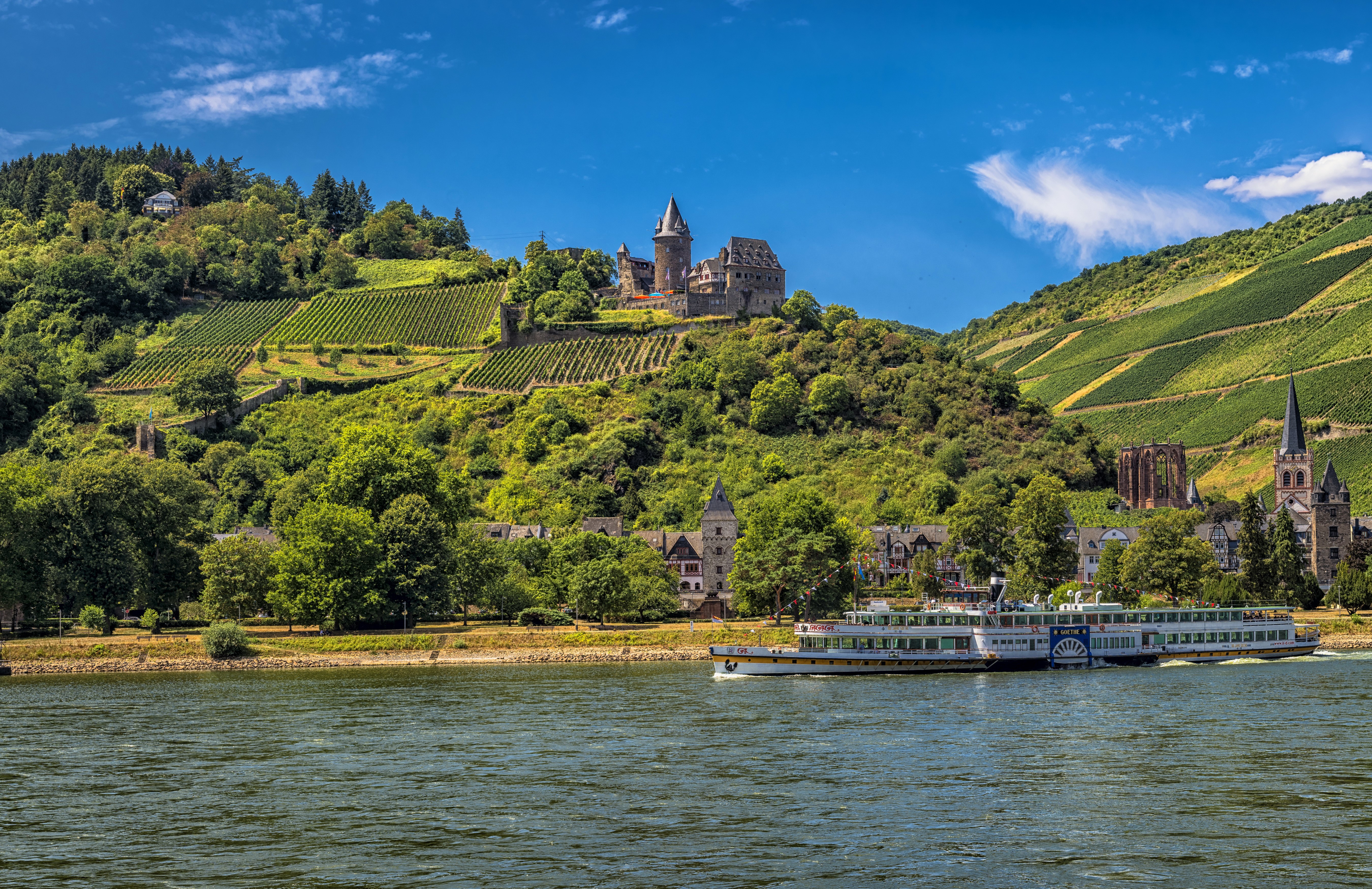 Riverboat on the Rhine River near Bacharach Castle, Germany HD Wallpaper
