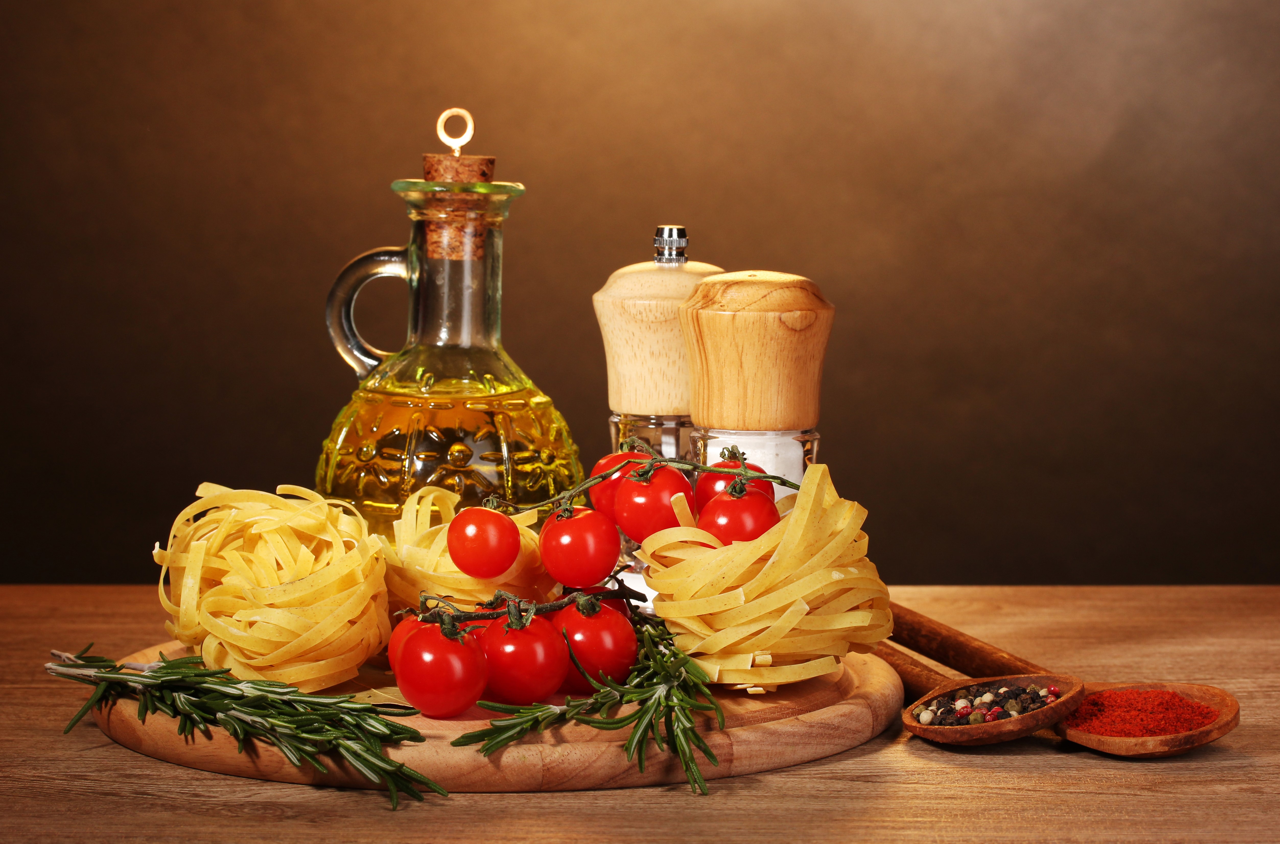 Pasta ingredients with olive oil and spices HD Wallpaper