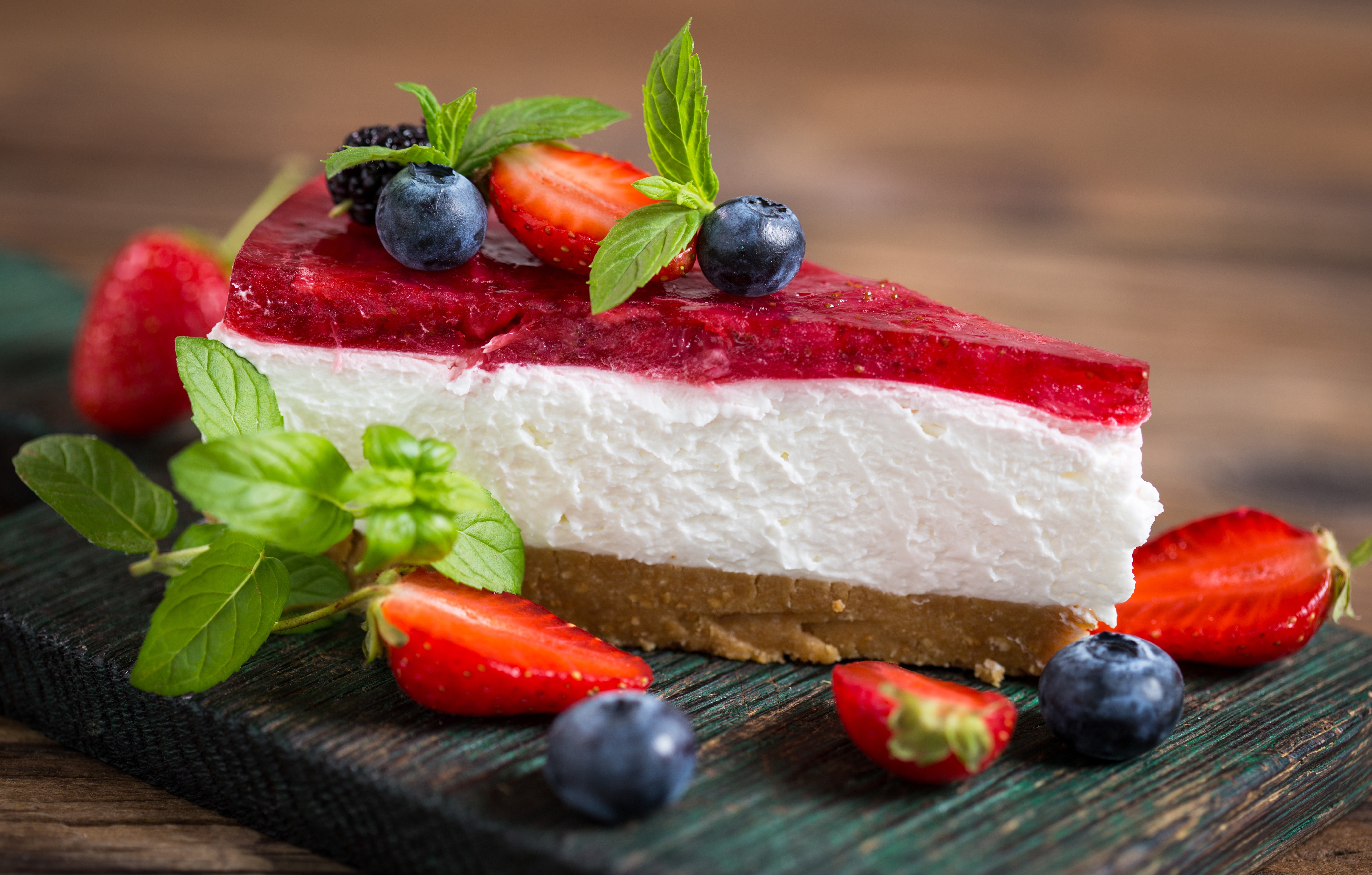 Slice of cheesecake with berries and mint HD Wallpaper