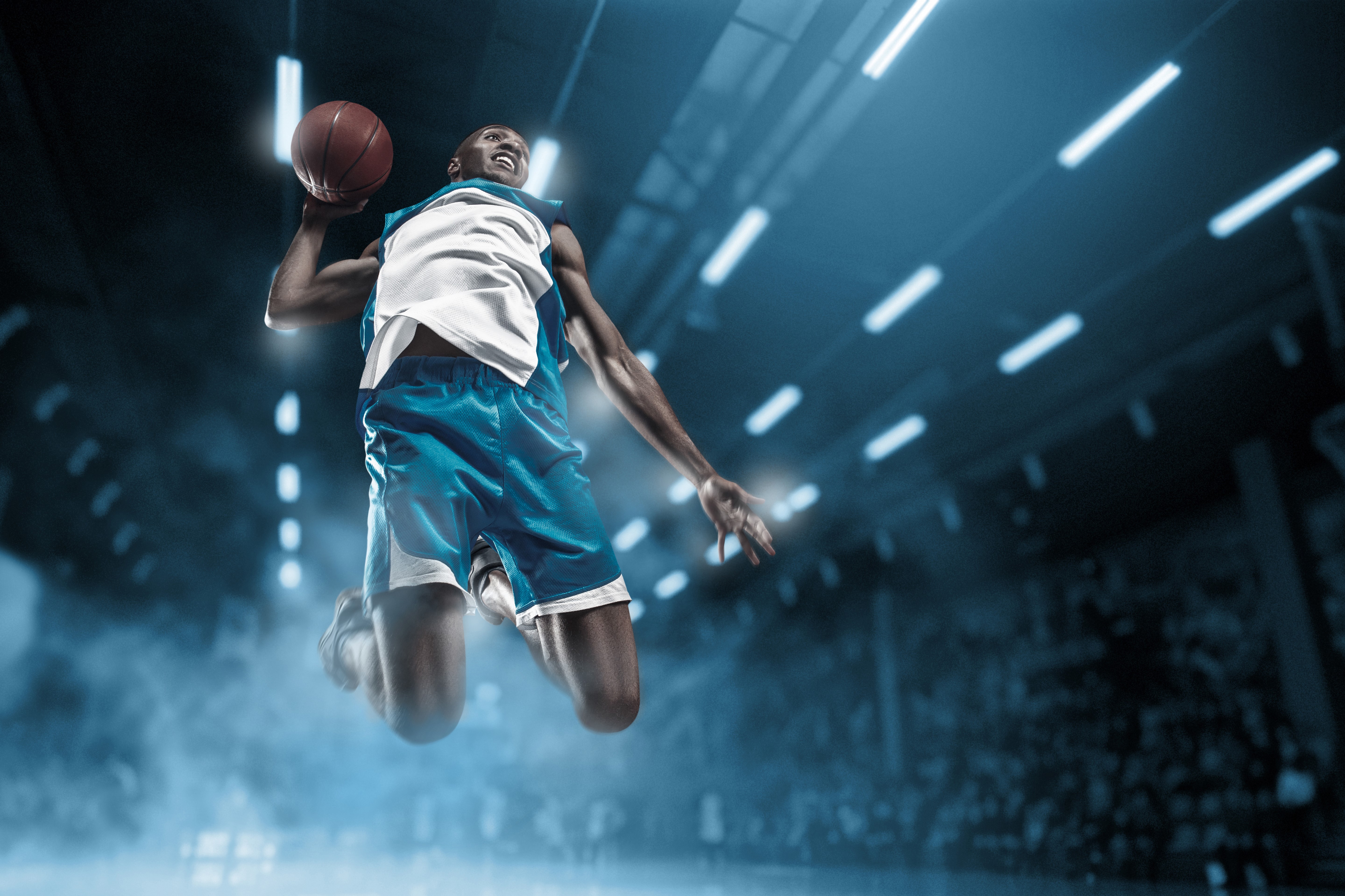 Basketball player jumping with ball HD Wallpaper