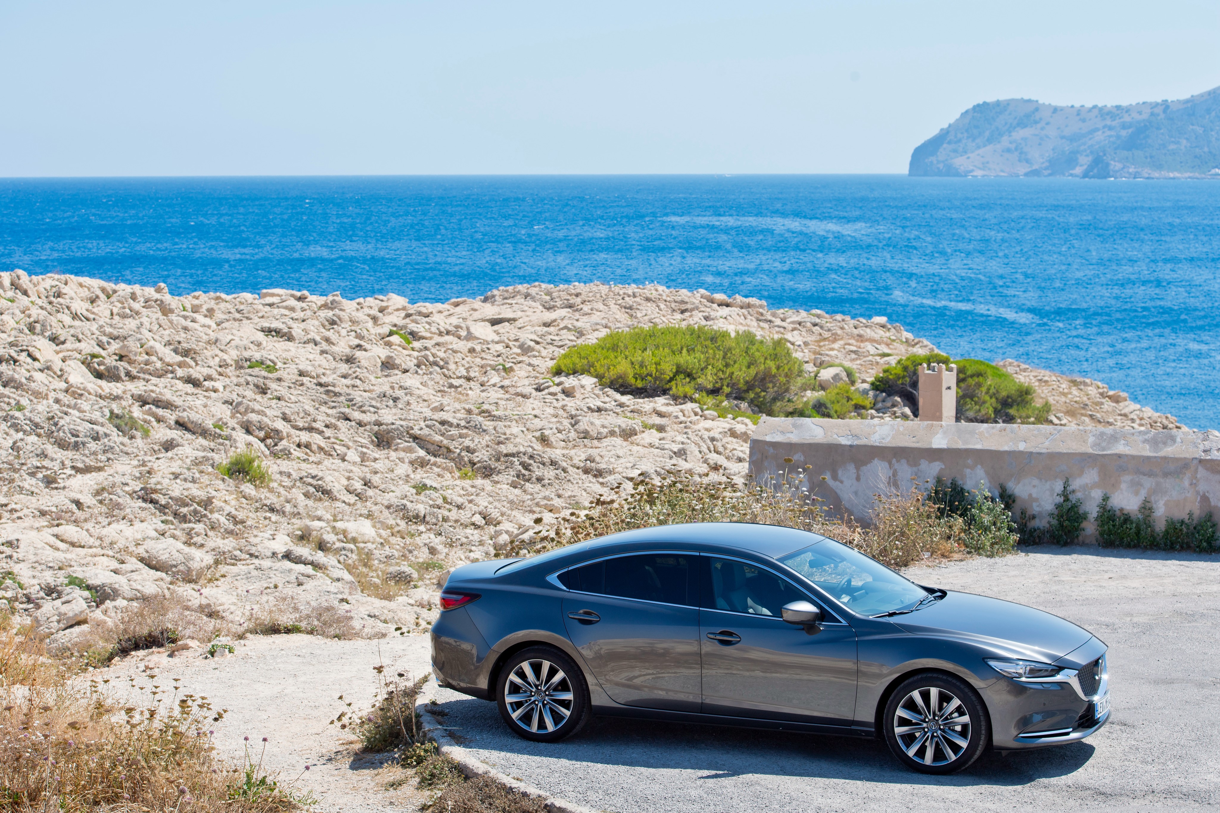 2018 Mazda 6 Sedan on rocky coast HD Wallpaper