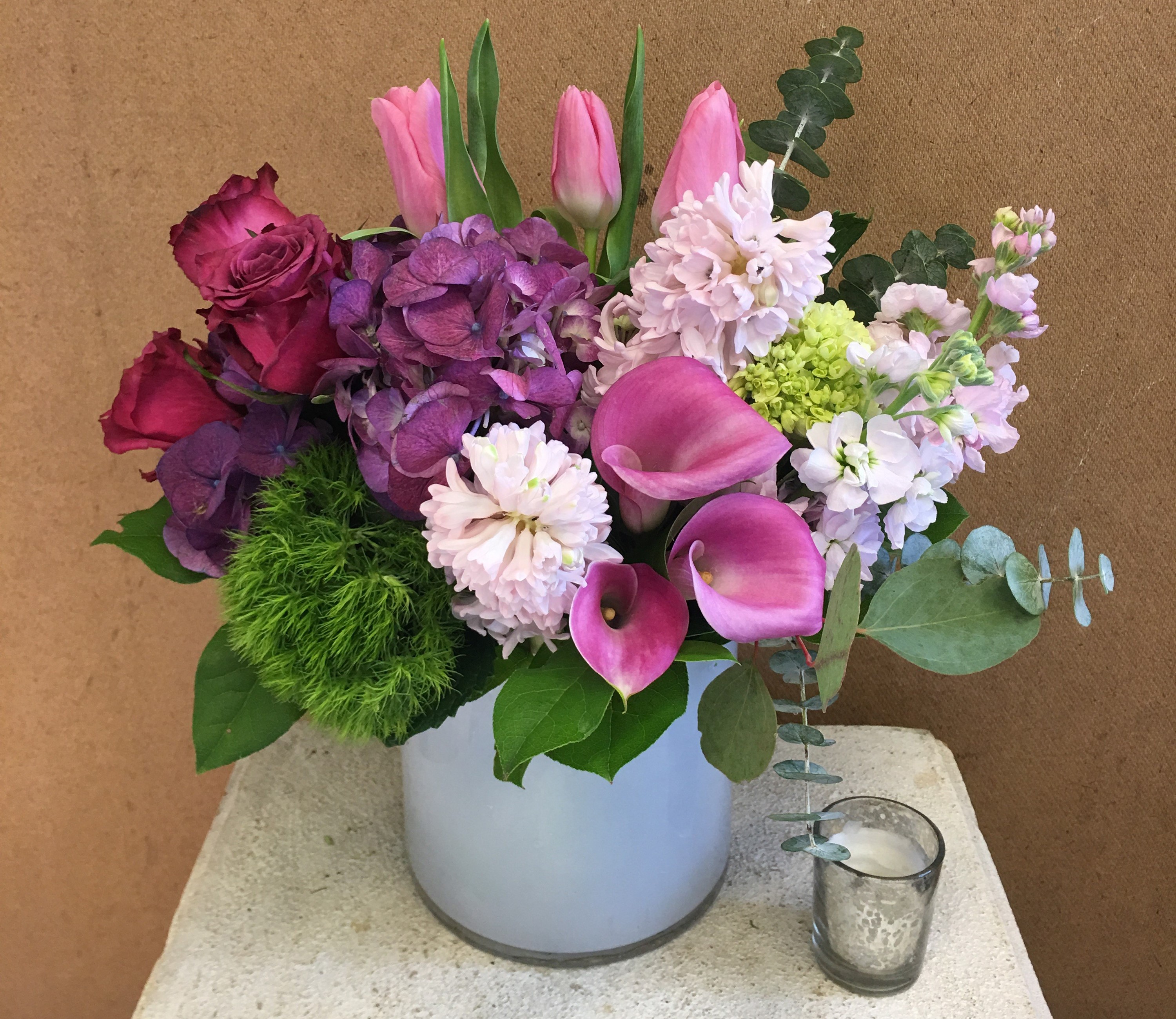 Pink and purple floral arrangement with roses, tulips, and calla lilies HD Wallpaper
