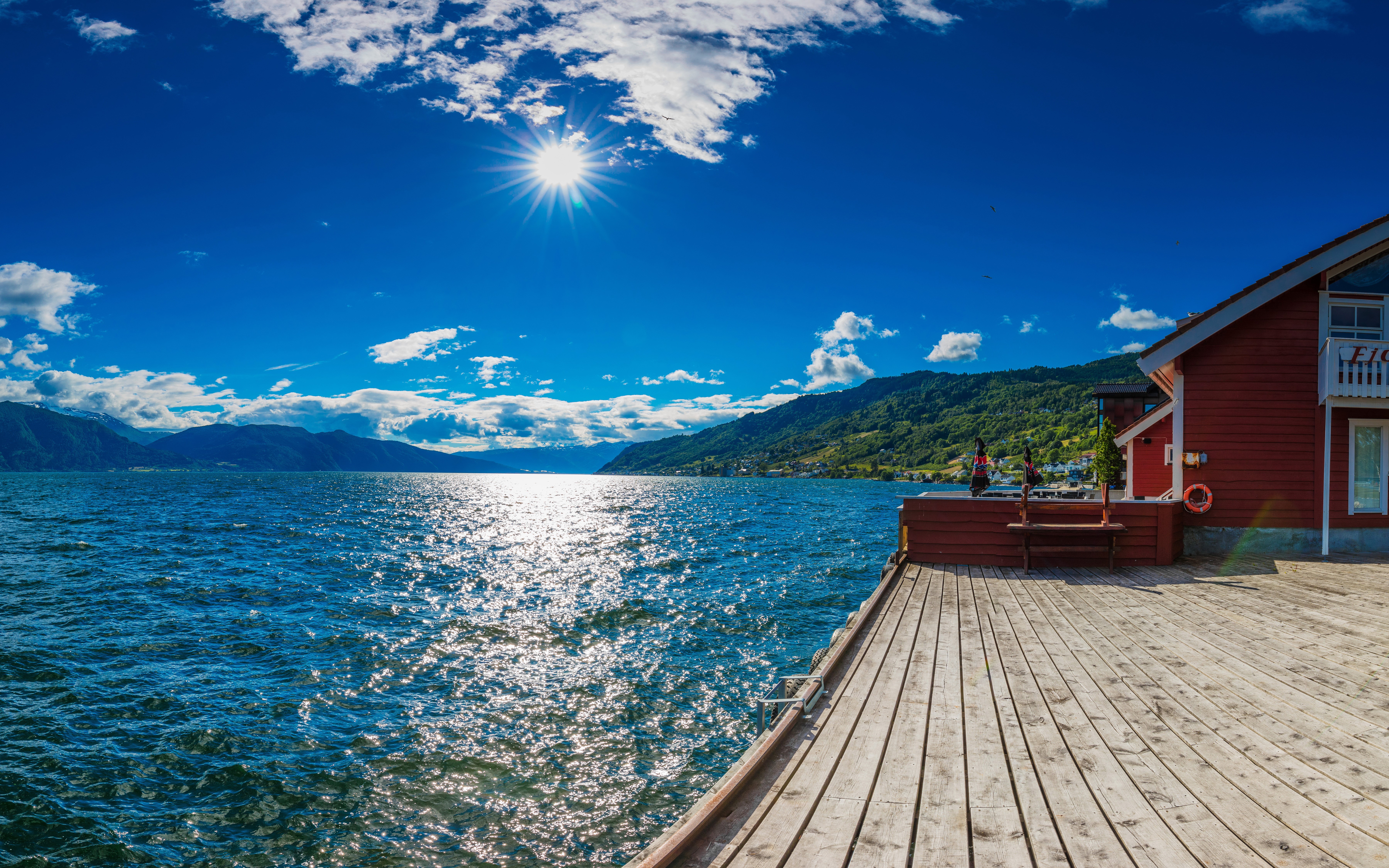 Wooden pier and red house on a lake in Norway HD Wallpaper