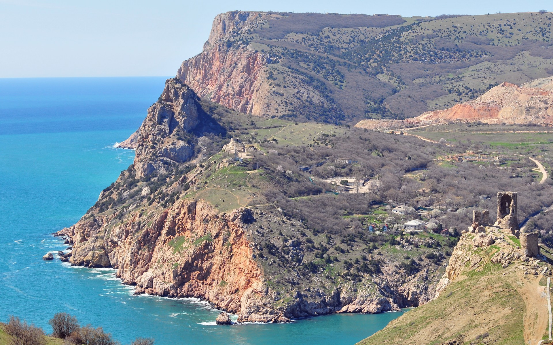 Ruins on a cliff overlooking the sea HD Wallpaper