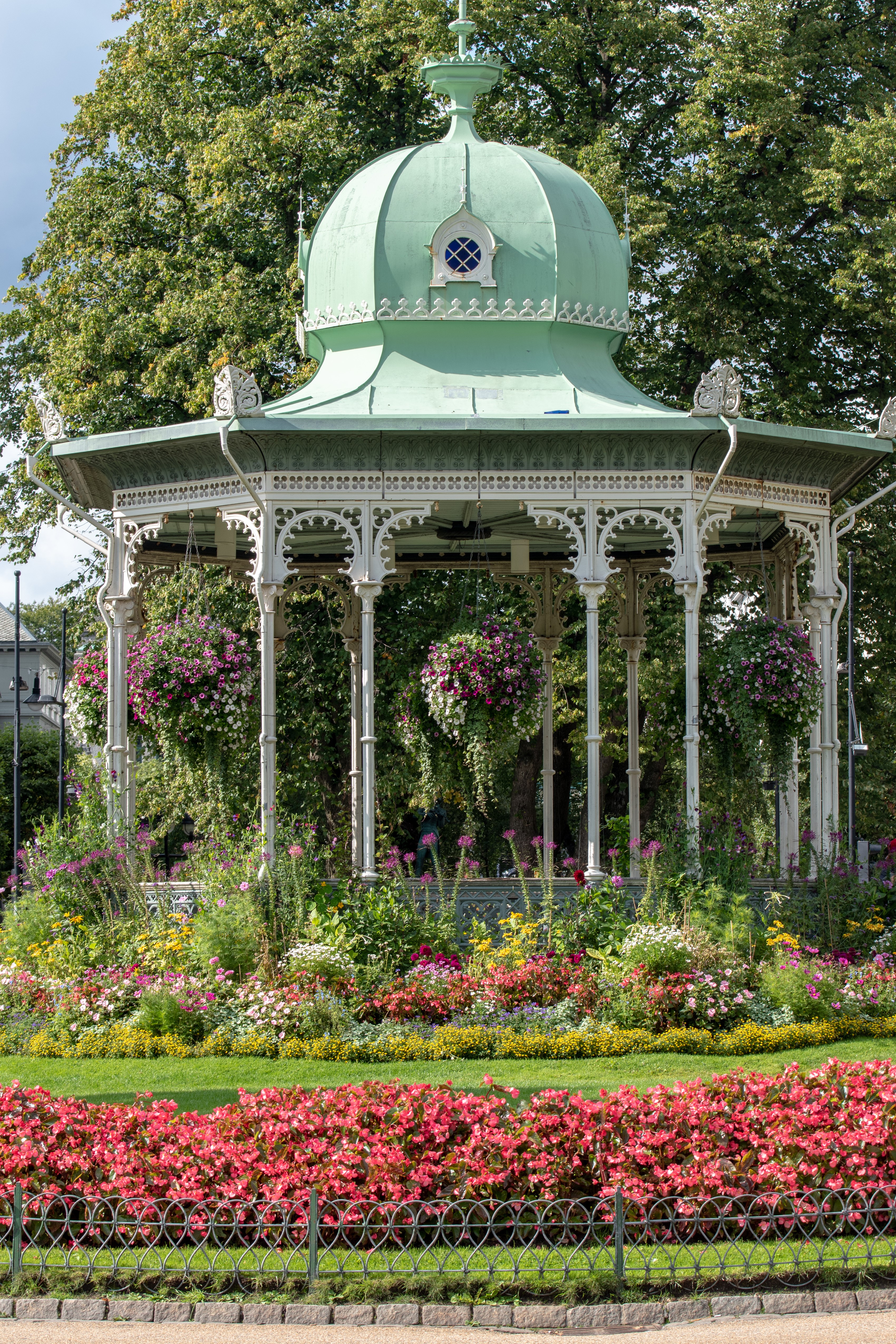 Gazebo in a park with flowers in Bergen, Norway HD Phone Wallpaper