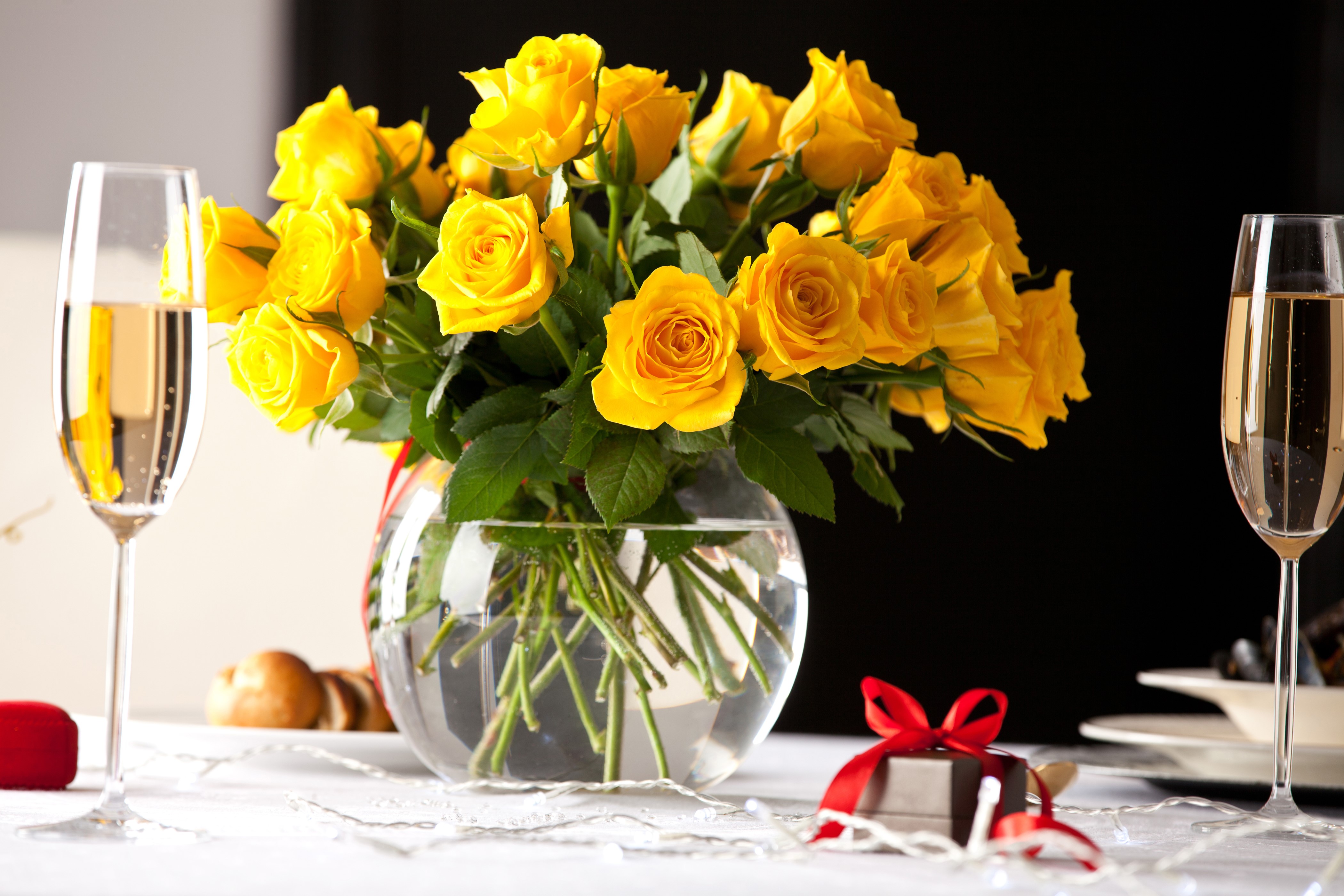 Yellow Roses in Vase with Champagne and Gifts HD Wallpaper