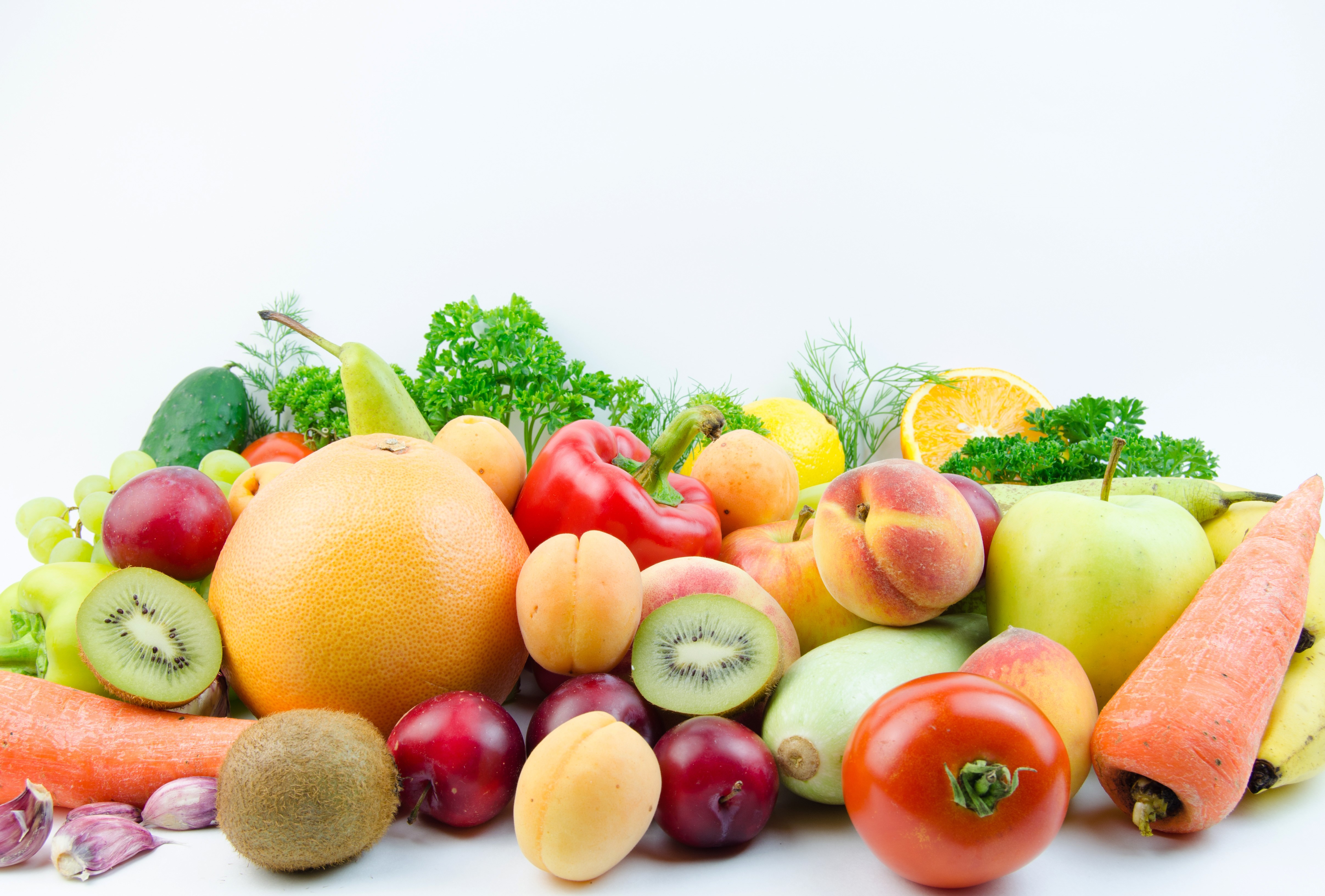 Assortment of fresh fruits and vegetables on a white background HD Wallpaper