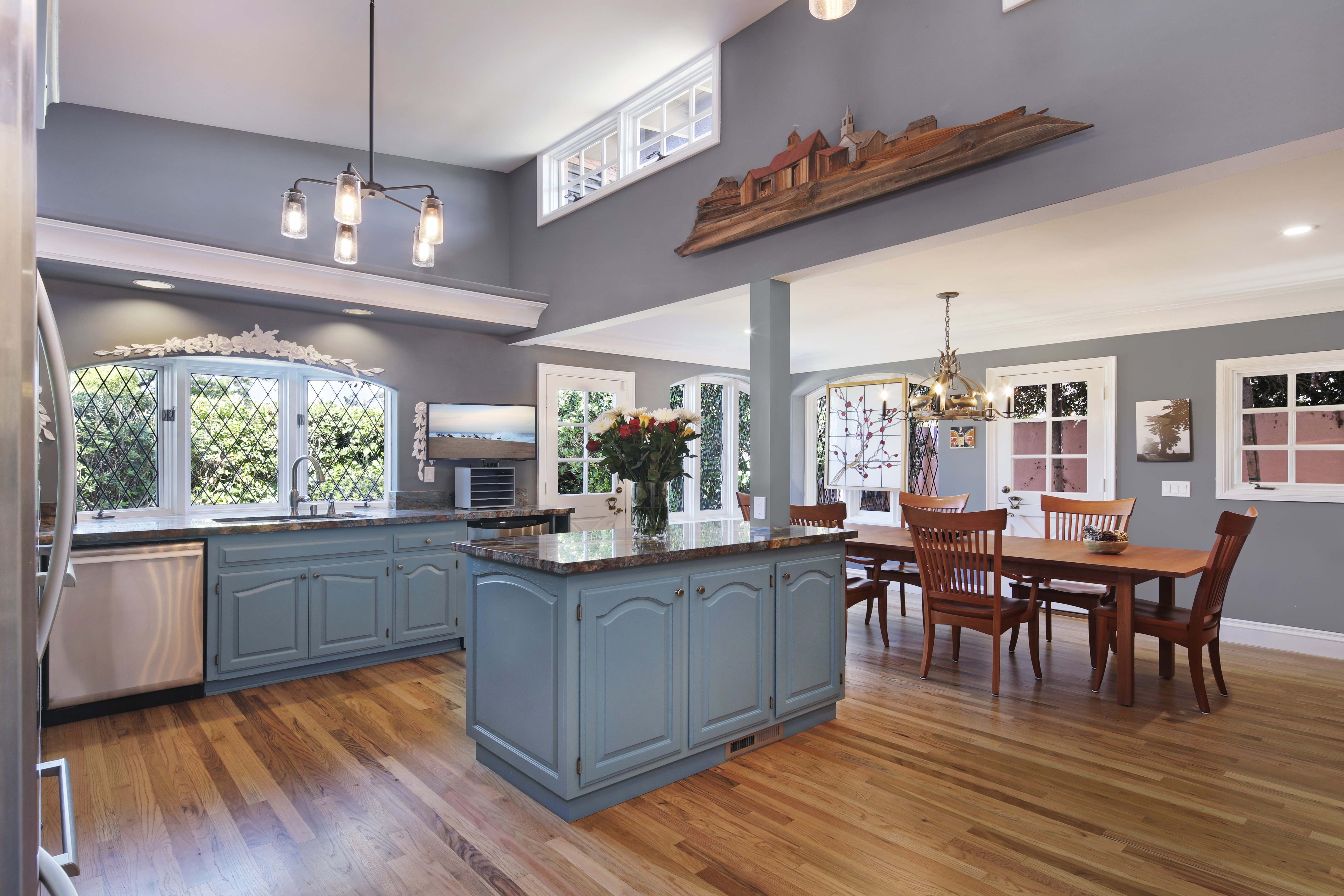 Kitchen with Island, Dining Table, and Chandelier HD Wallpaper