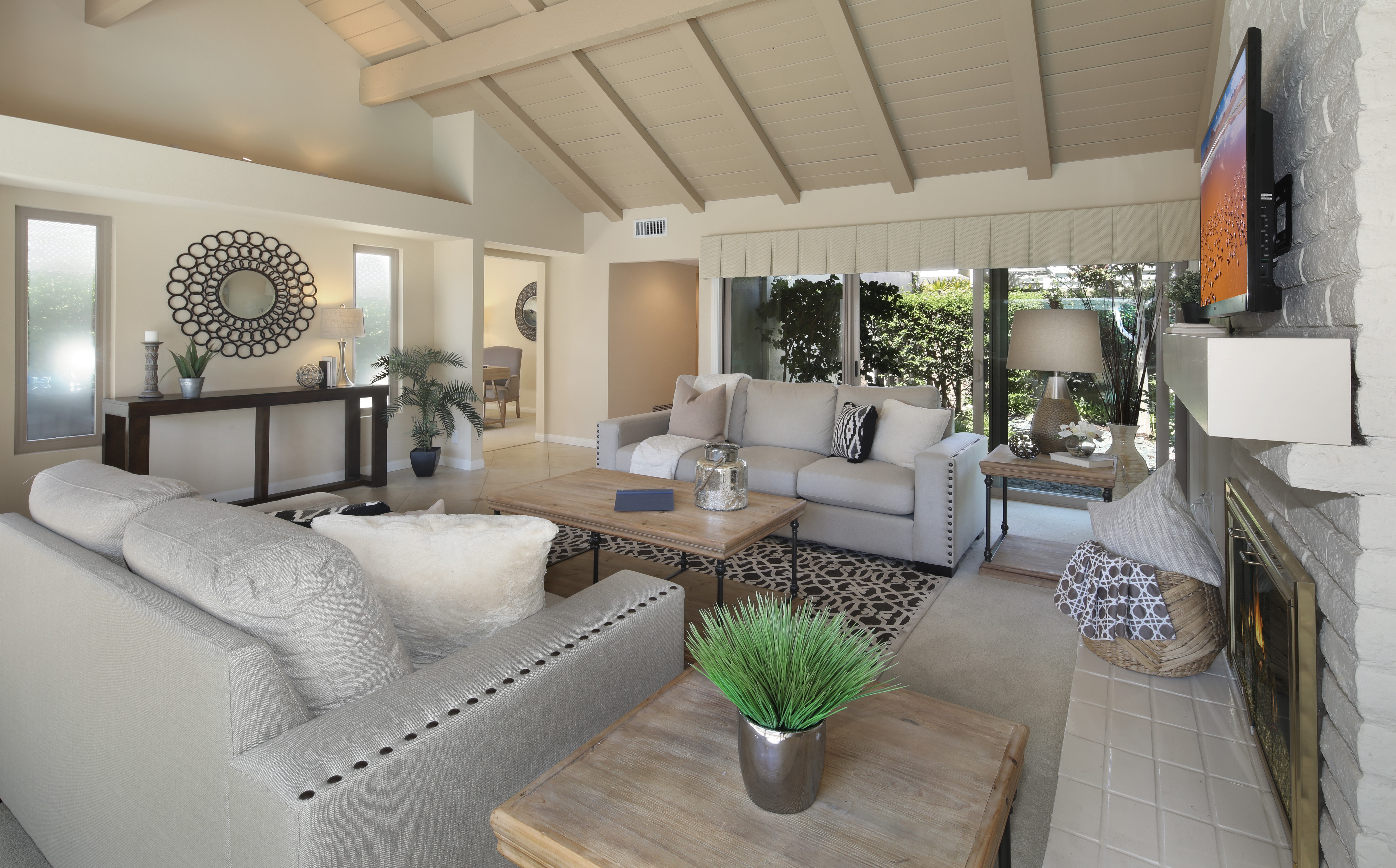 Living room interior design with sofas and a fireplace HD Wallpaper