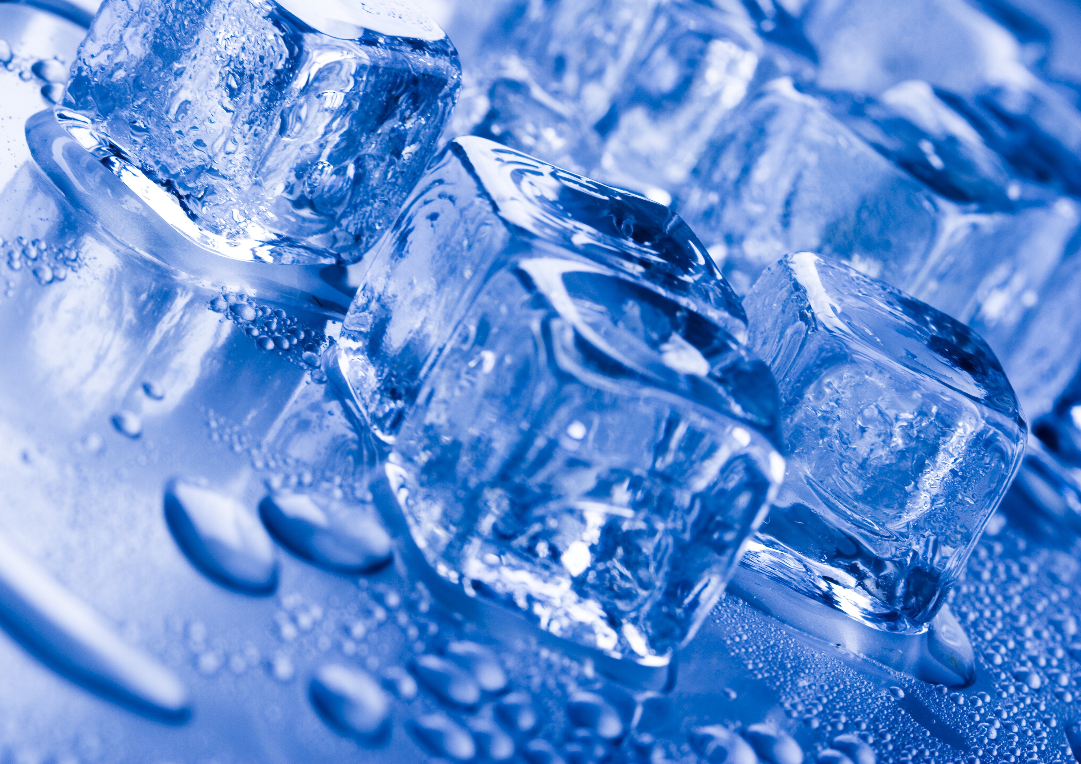 Closeup of ice cubes with water droplets HD Wallpaper
