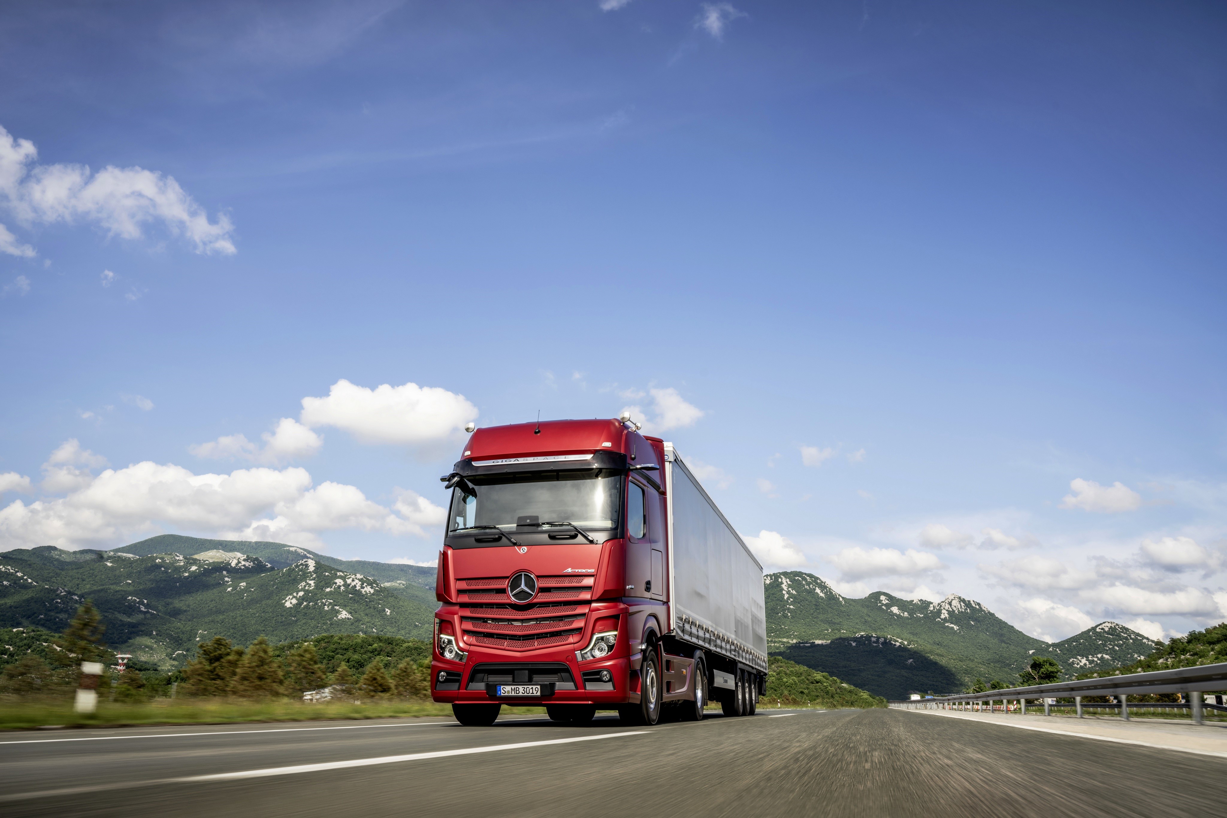 Red Mercedes-Benz 4x2 Actros Truck in Motion HD Wallpaper