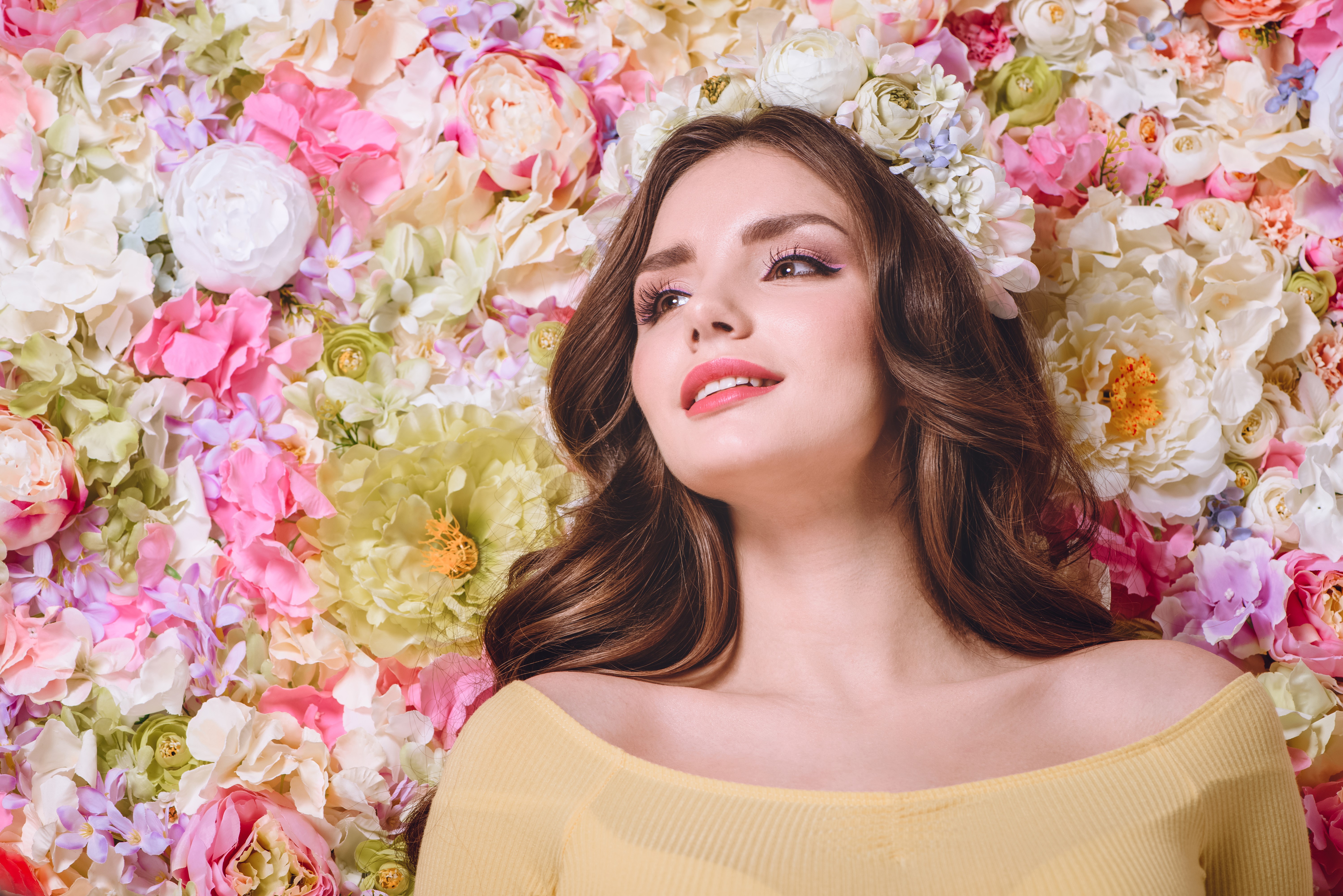 Brown haired woman with flowers HD Wallpaper