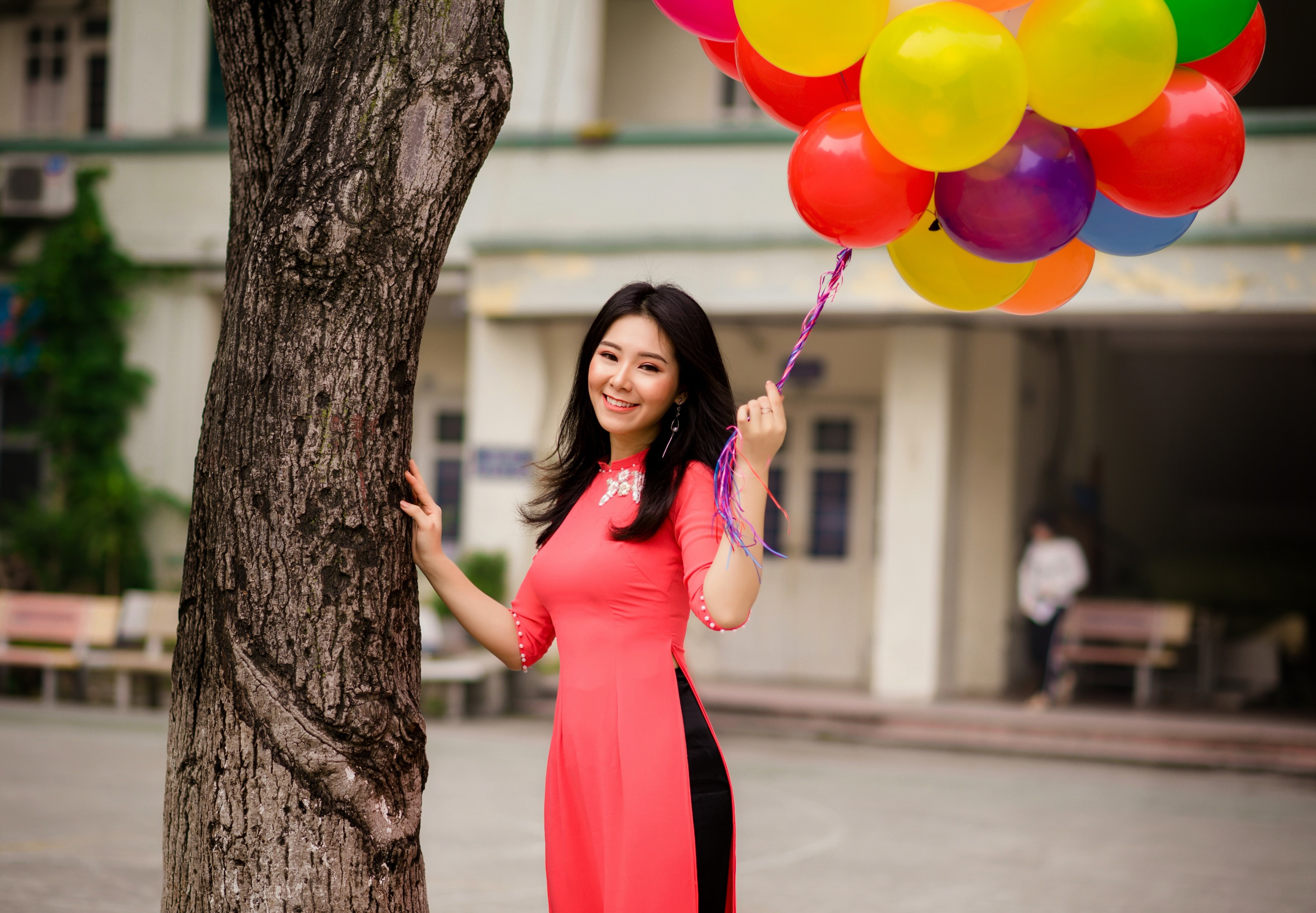 Beautiful Asian girl with balloons and tree HD Wallpaper