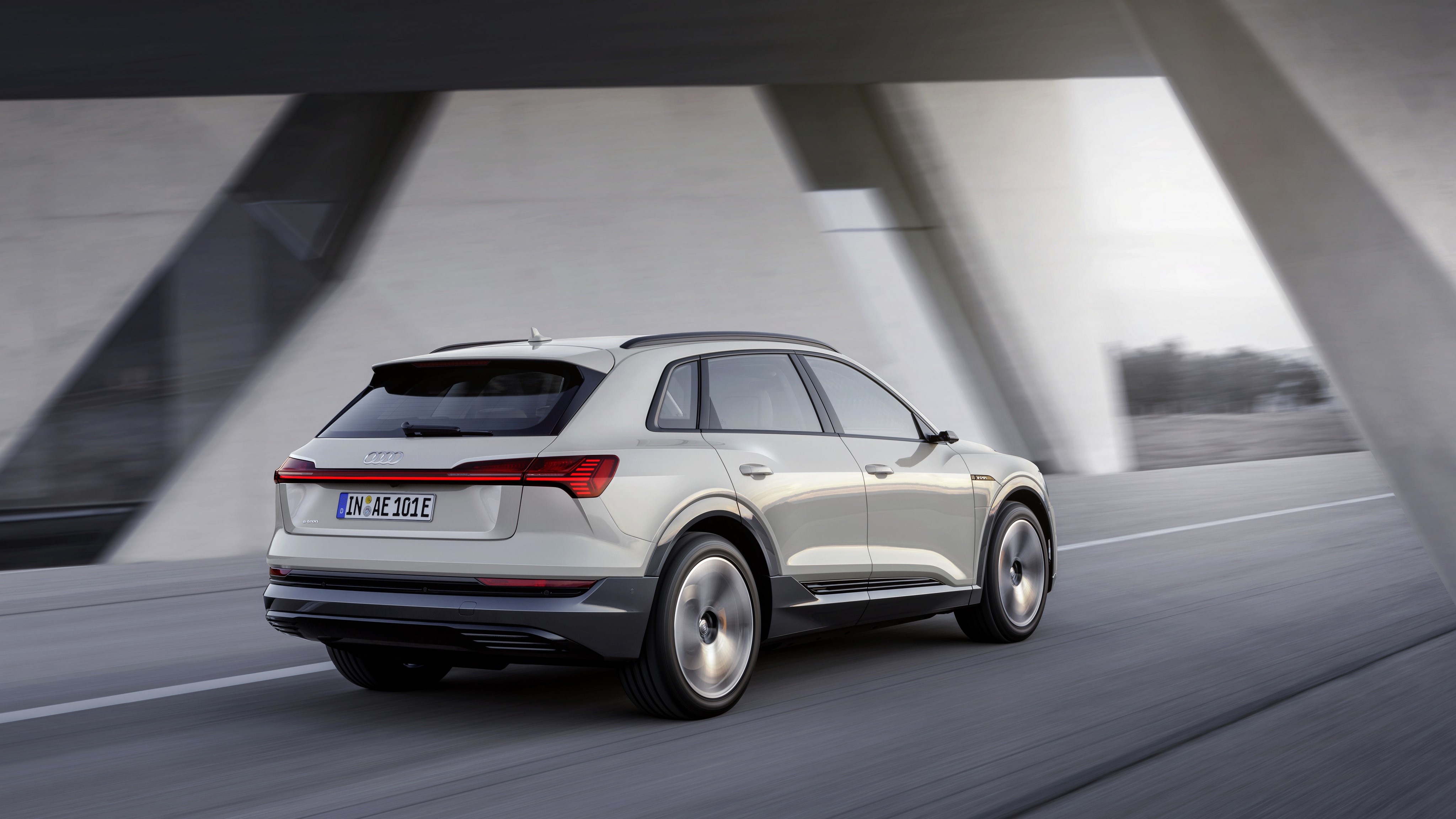 Audi E-Tron 2019 driving on a road HD Wallpaper
