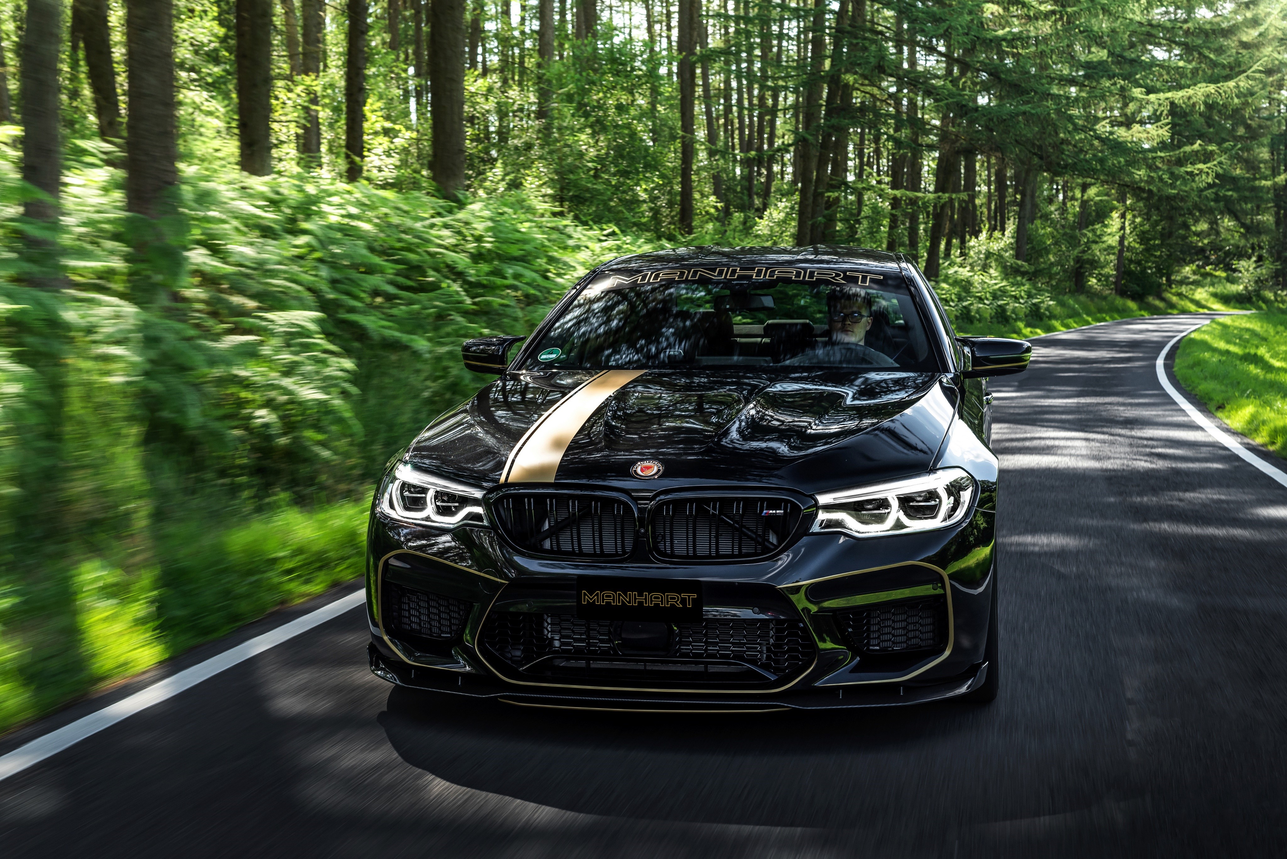 Manhart MH5 700 BMW M5 F90 on a Forest Road HD Wallpaper