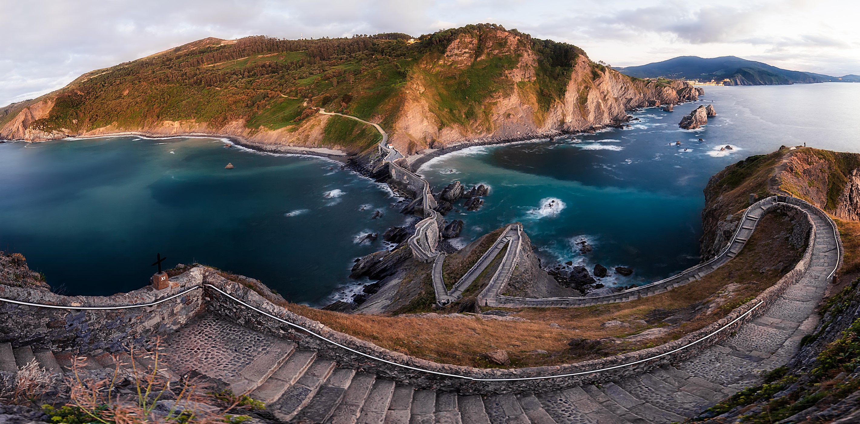 San Juan de Gaztelugatxe island with winding stairs and bay HD Wallpaper