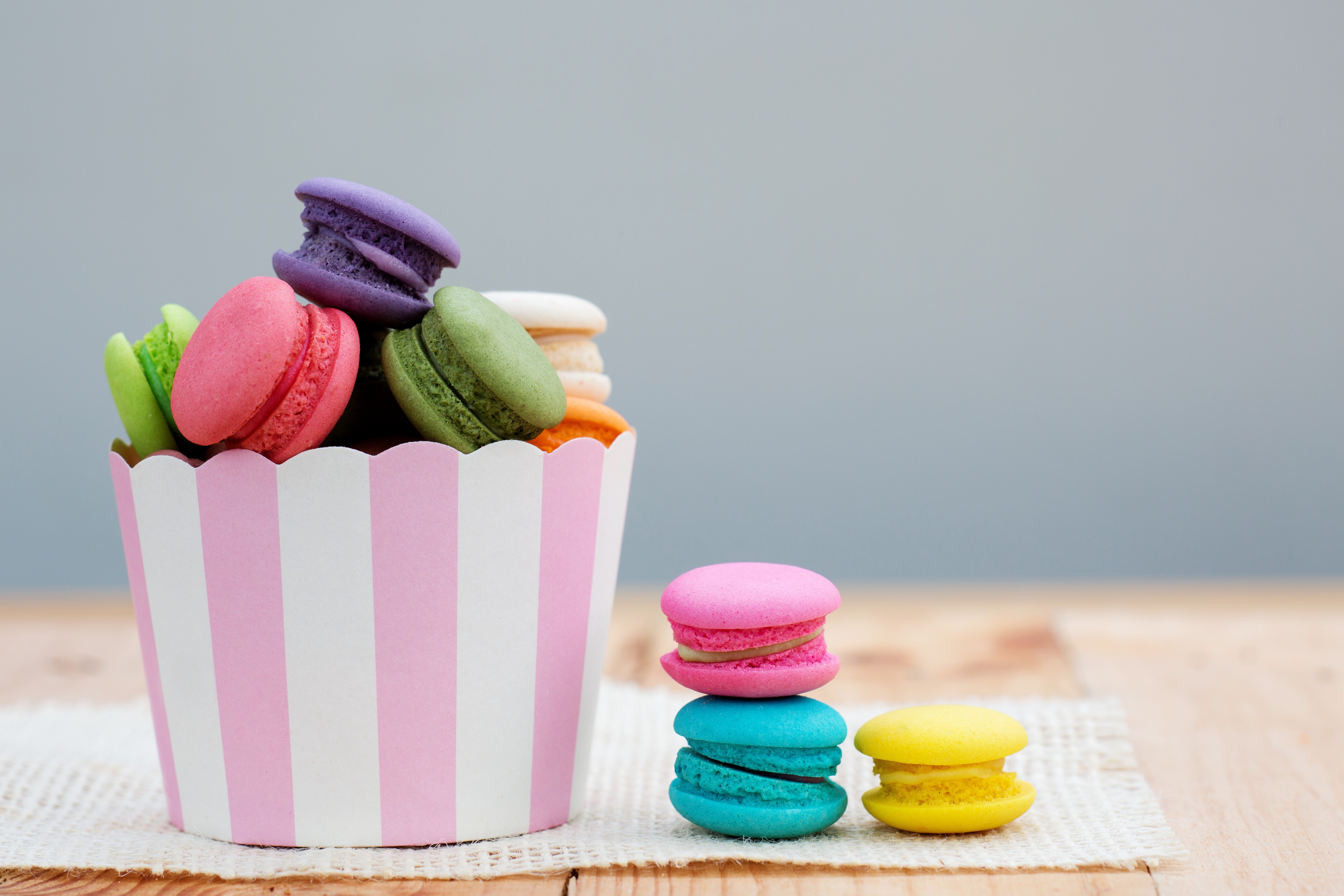 Colorful Macarons in a Striped Cup HD Wallpaper