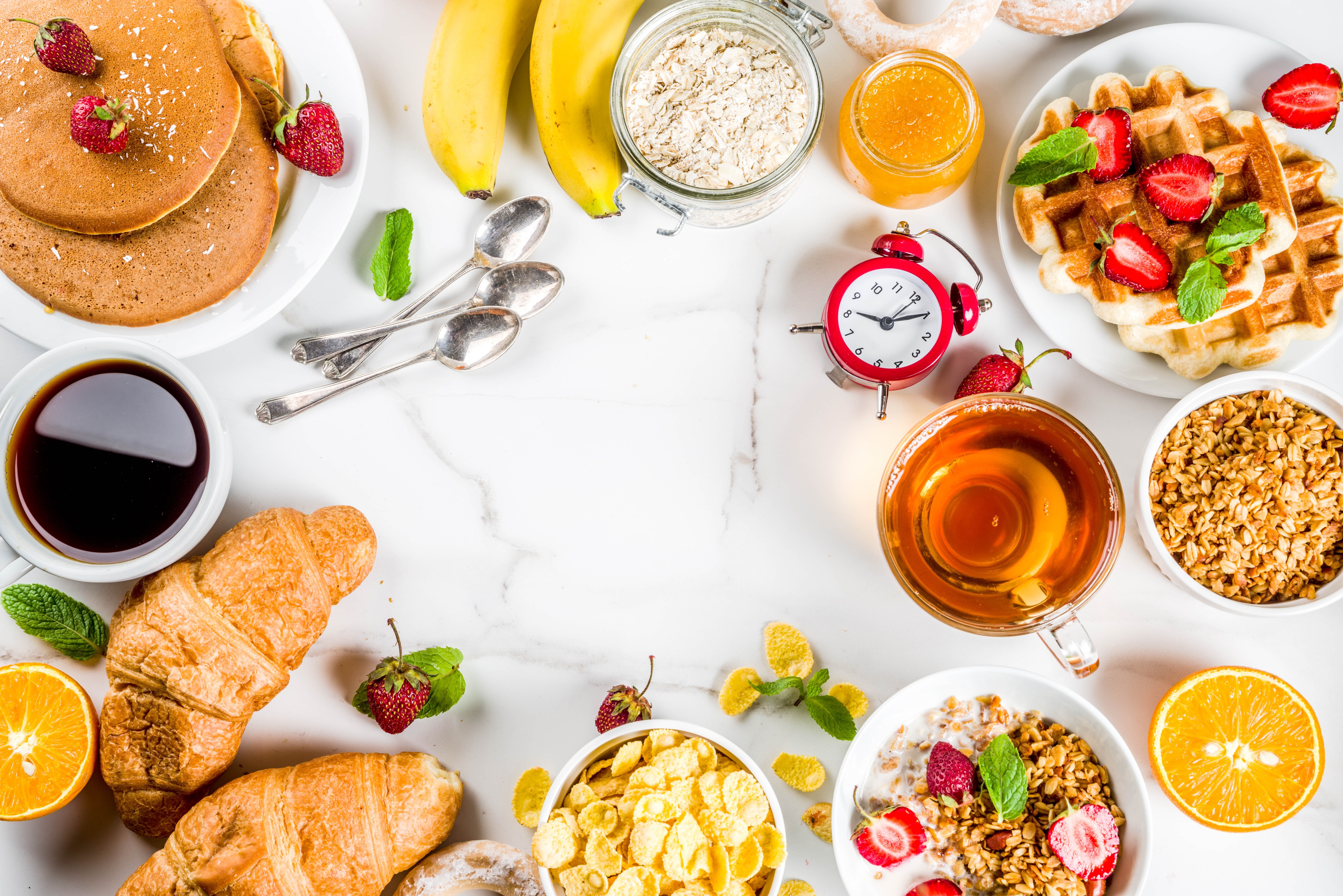 Breakfast Spread with Pancakes, Waffles, Croissants, and Fruit HD Wallpaper