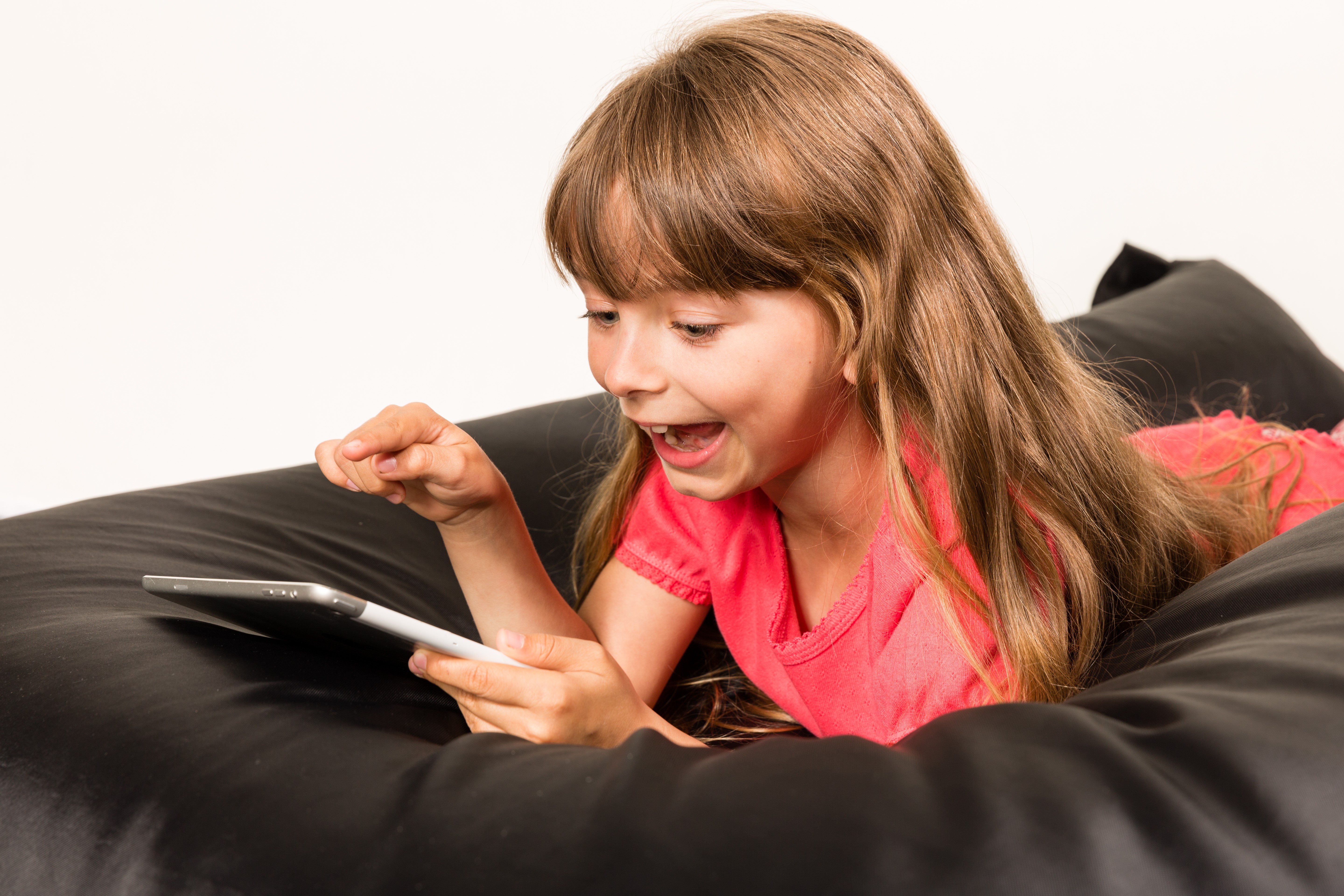 Girl using a tablet computer HD Wallpaper