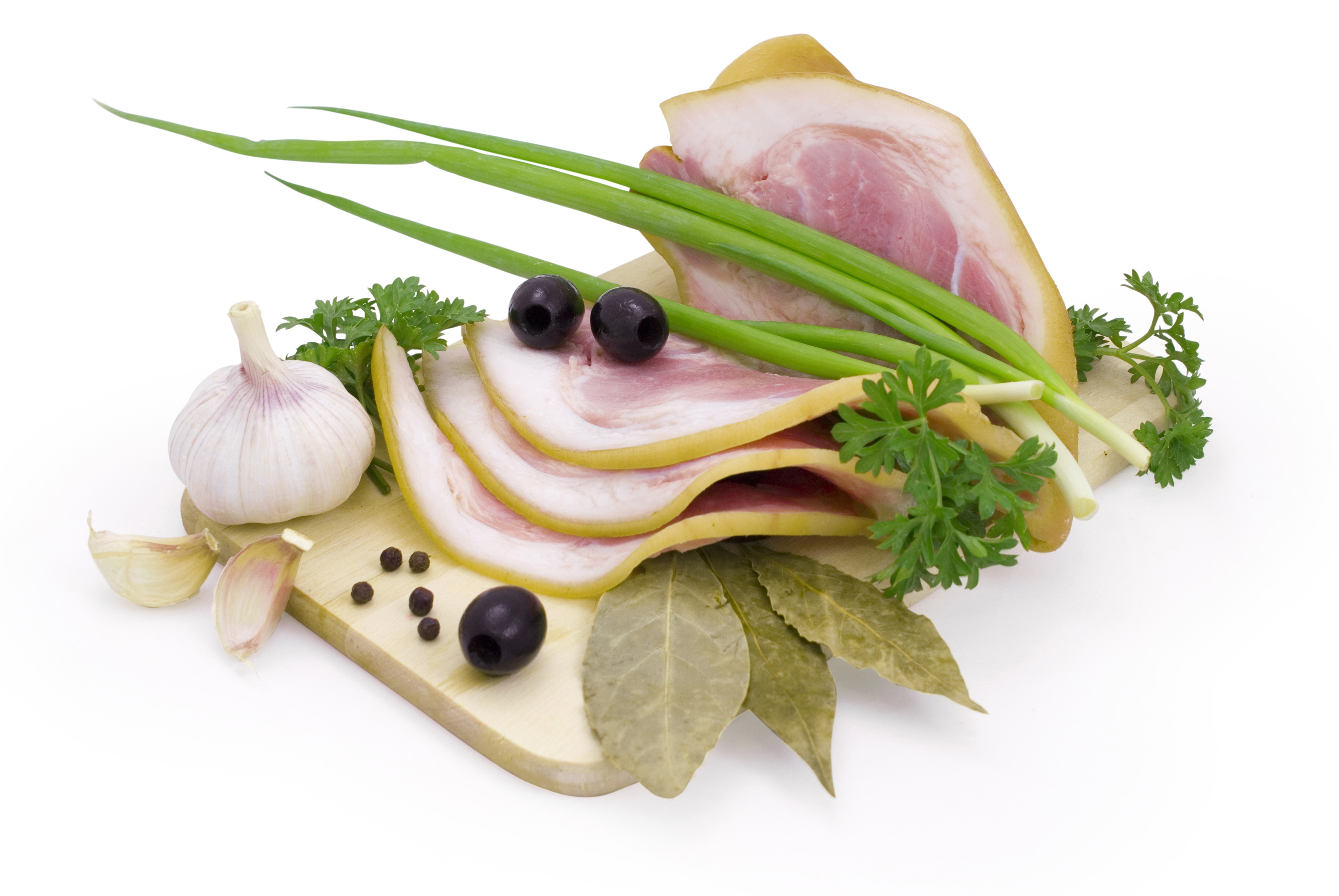 Meat products with garlic, olives, and herbs on a cutting board HD Wallpaper