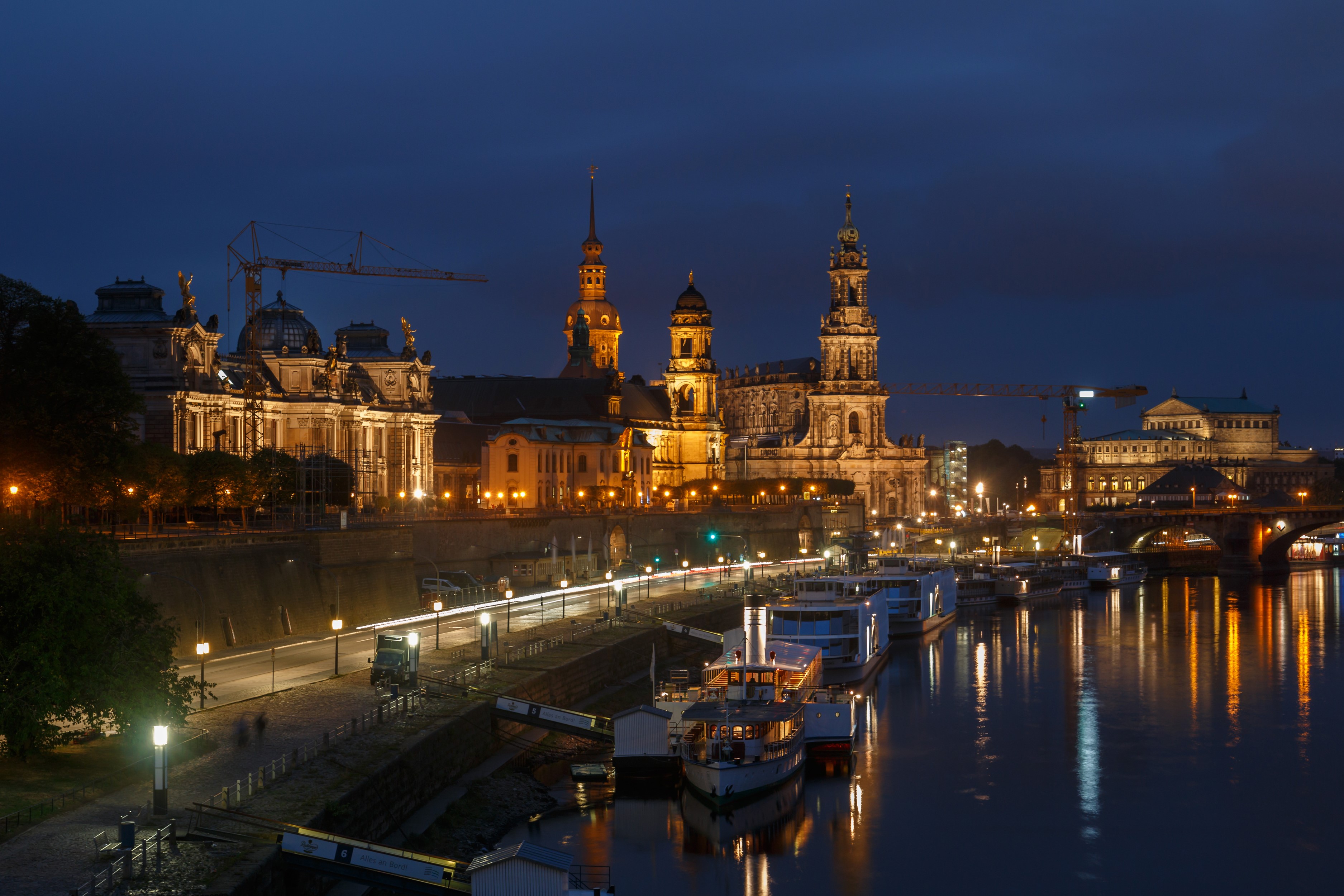 Dresden skyline with river and boats at night HD Wallpaper