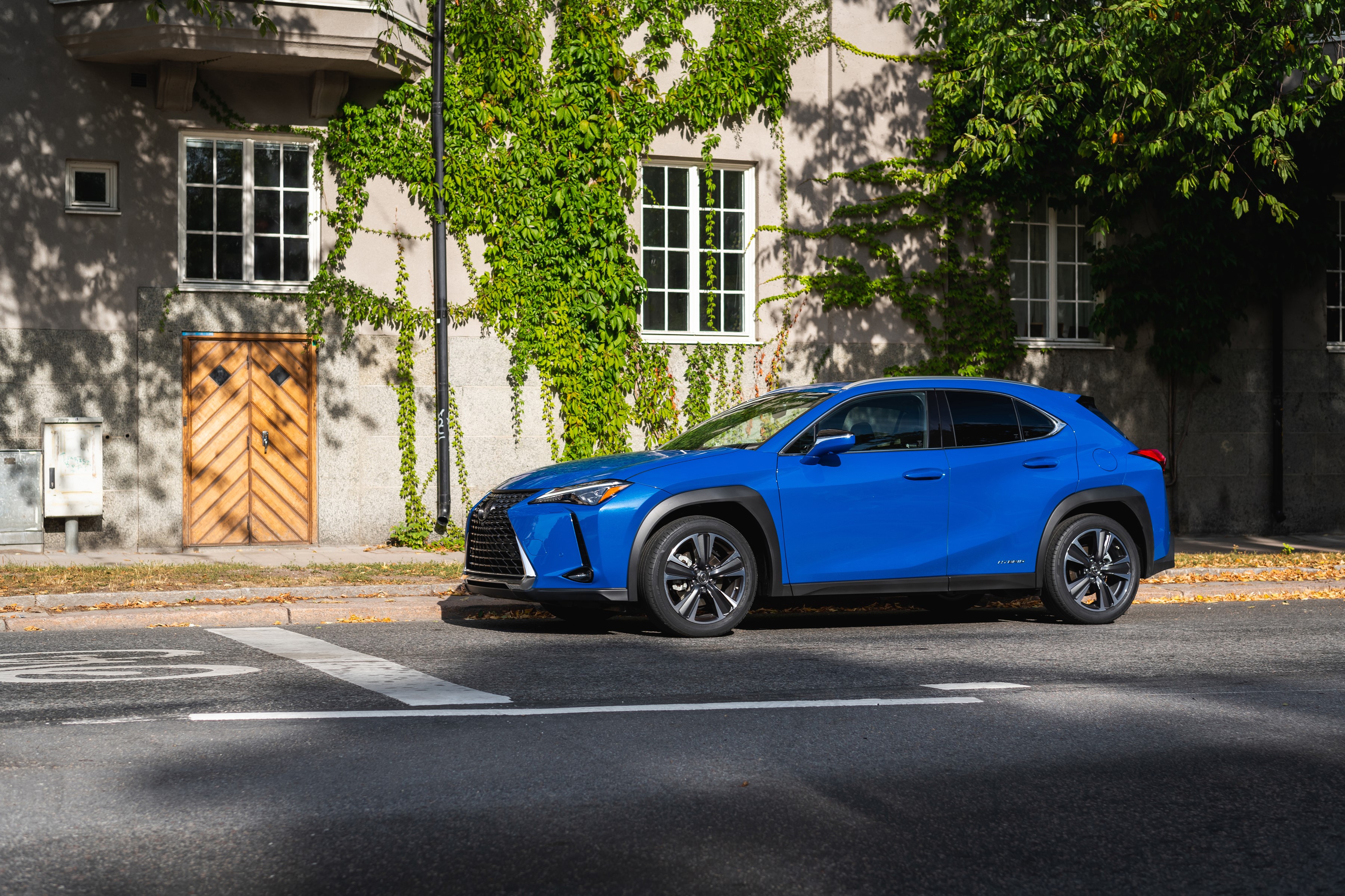 Blue Lexus UX 250h parked on street HD Wallpaper