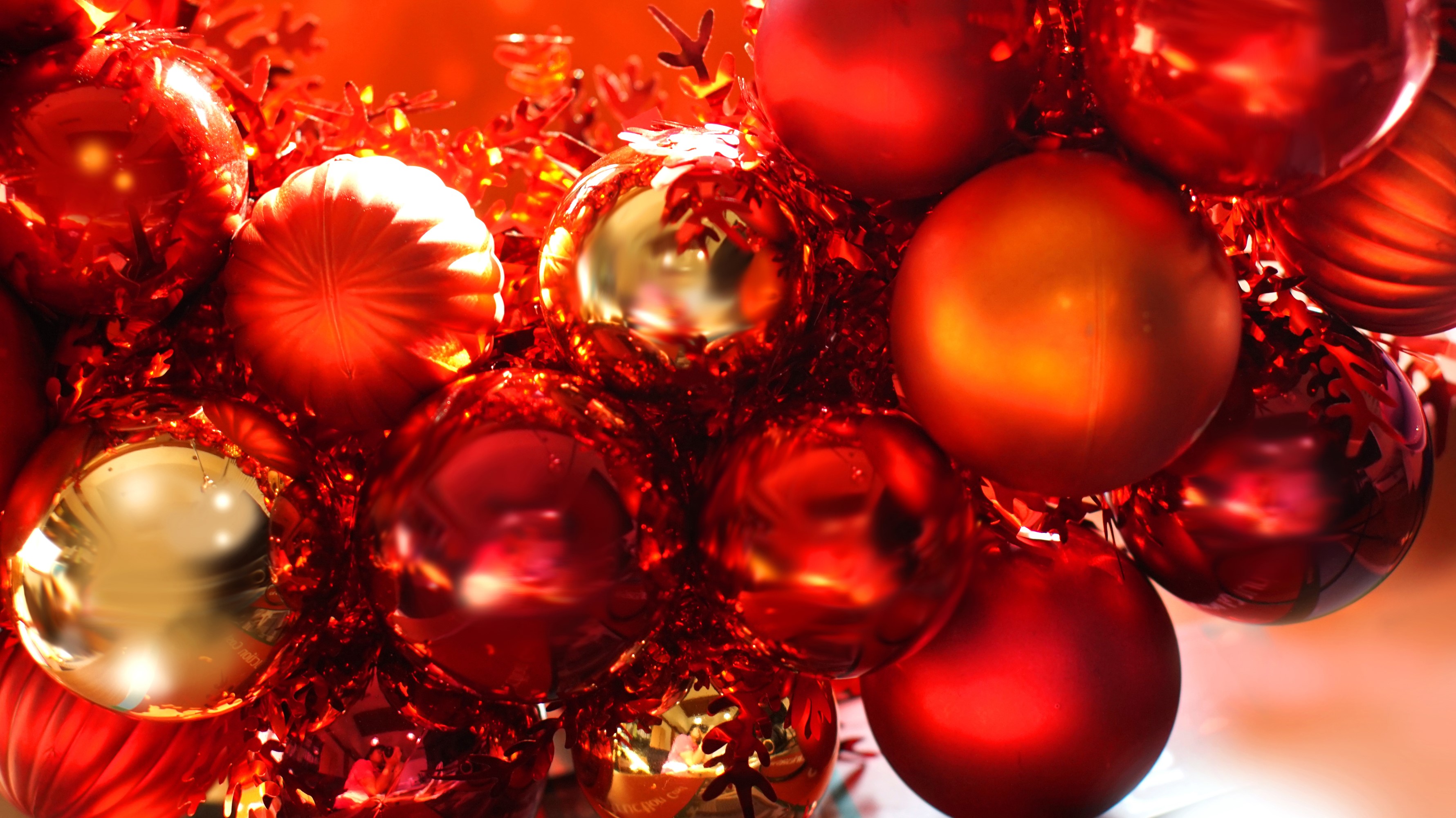 Red and gold Christmas ornaments with tinsel HD Wallpaper