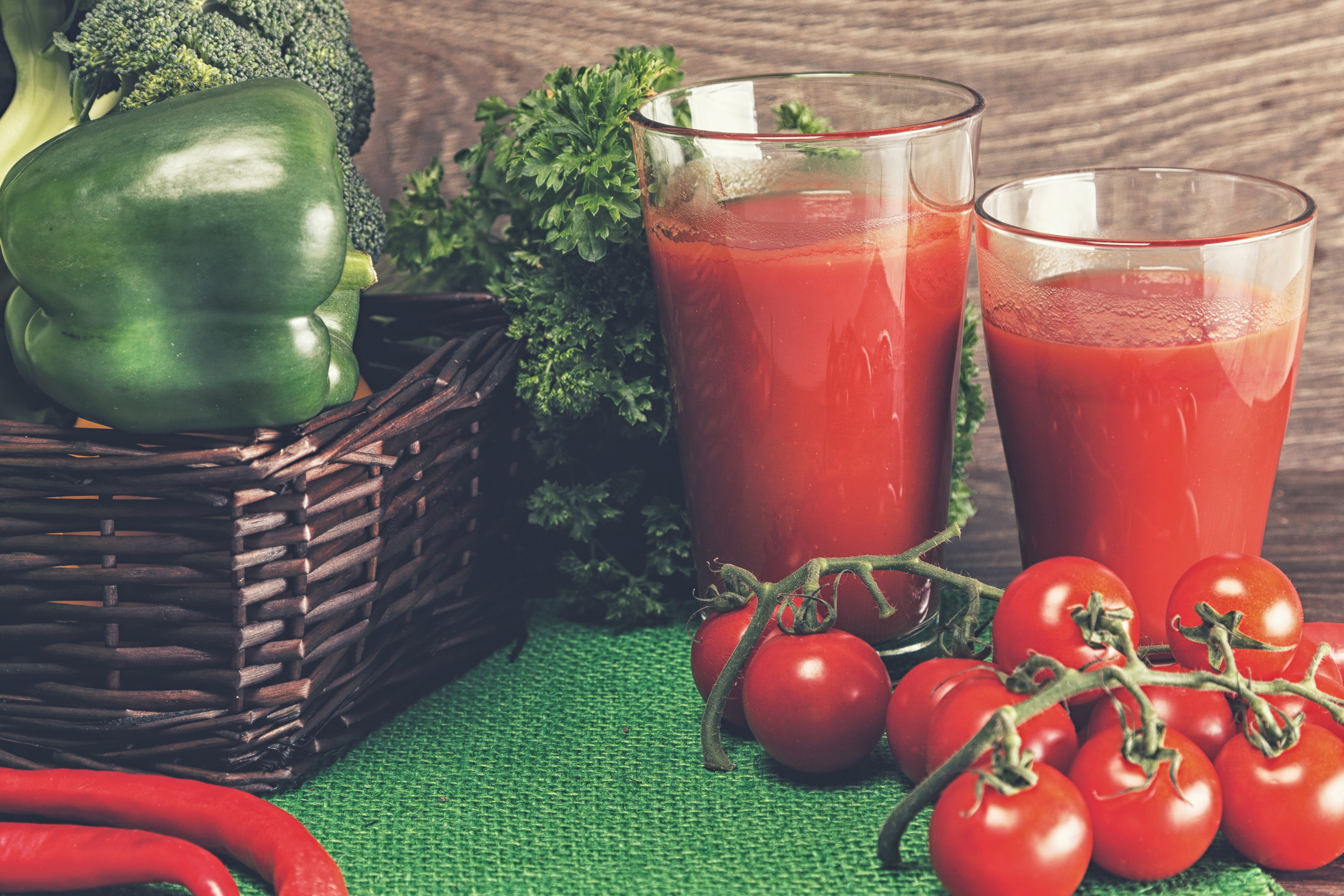 Two glasses of tomato juice with tomatoes and vegetables HD Wallpaper