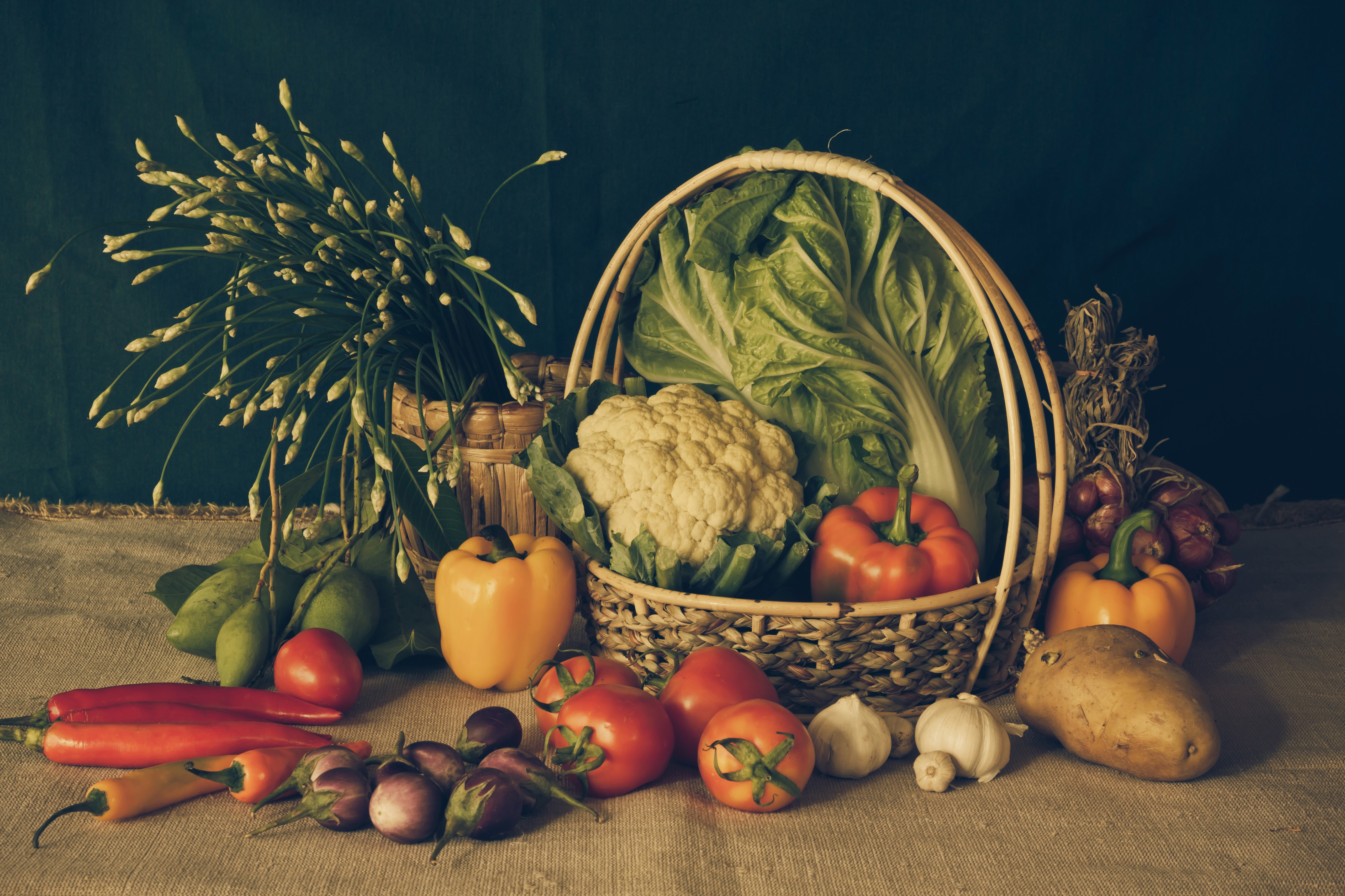 Vegetables in a wicker basket with a dark background HD Wallpaper