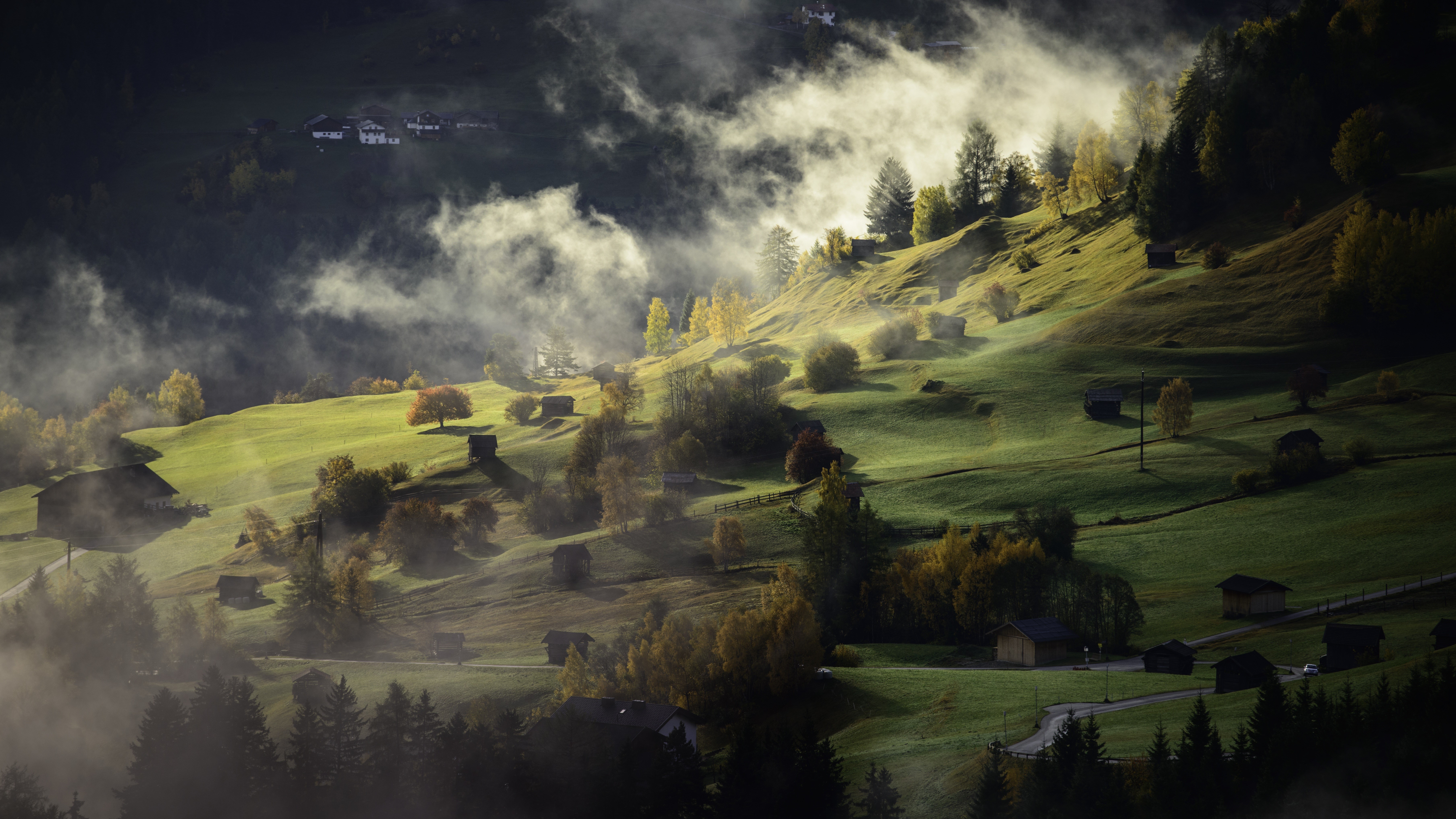 Misty Alps village with rolling green hills HD Wallpaper