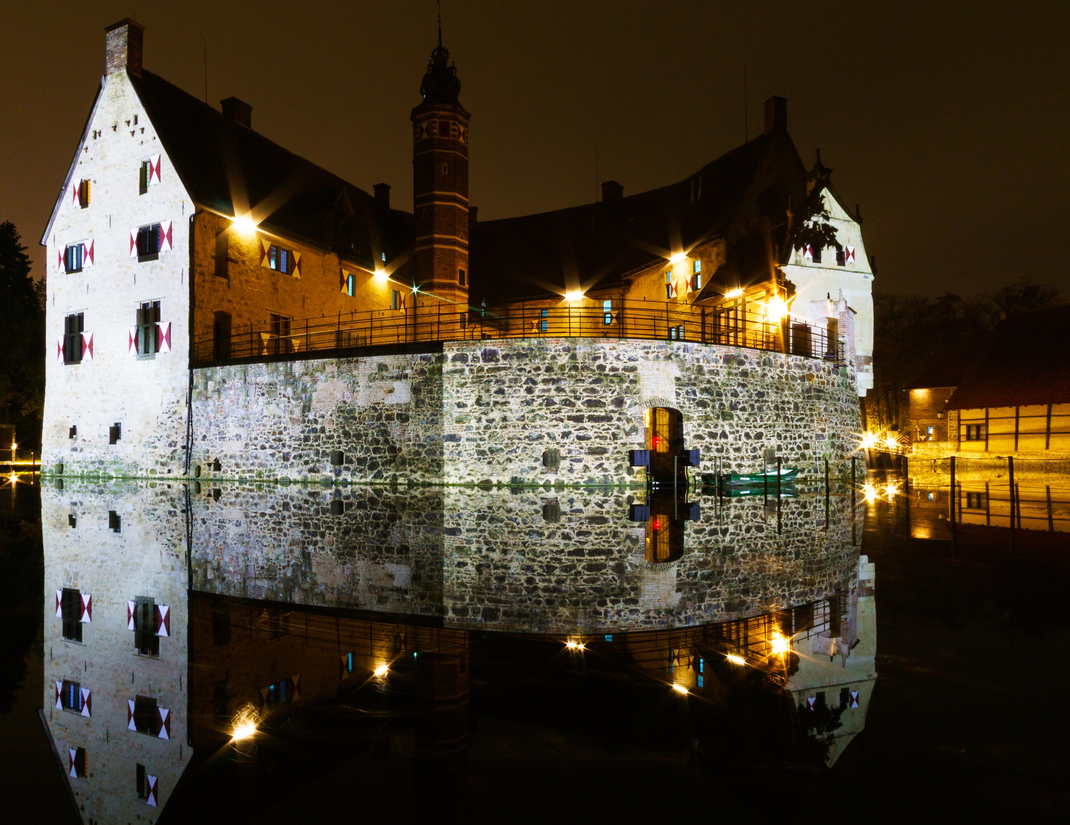 Vischering Castle reflected in water at night HD Wallpaper