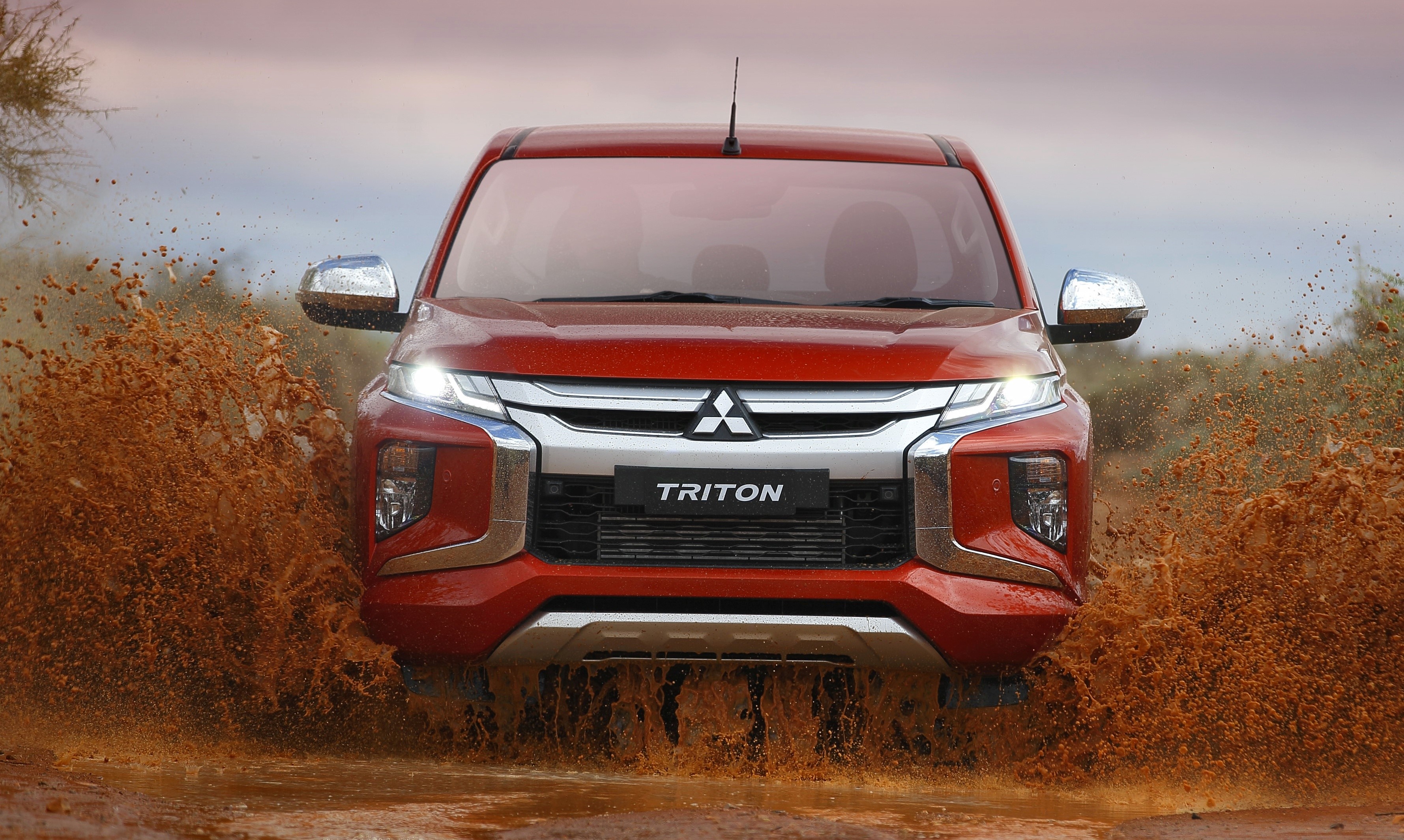 Red Mitsubishi Triton Pickup Truck Driving Through Mud HD Wallpaper