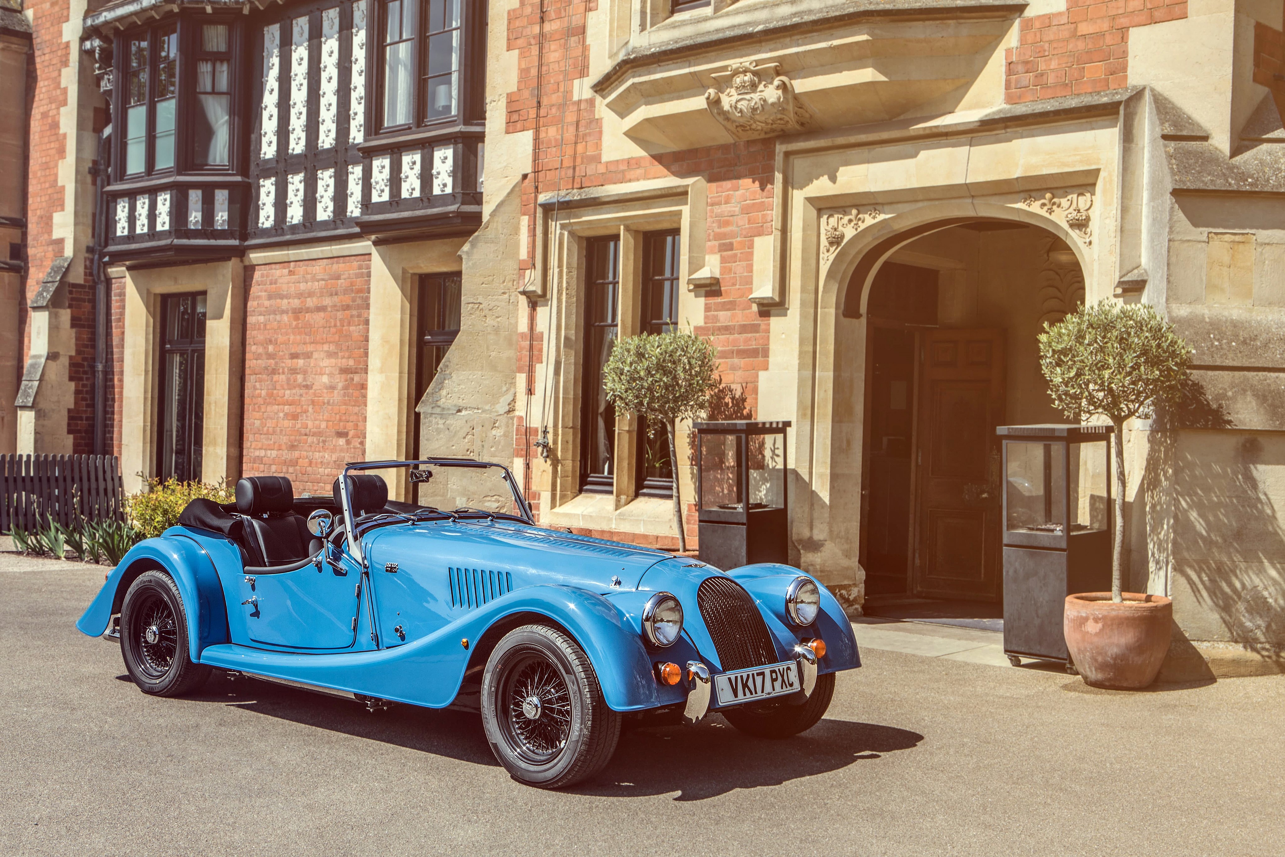 Light Blue Morgan Cabriolet at Historic Building HD Wallpaper
