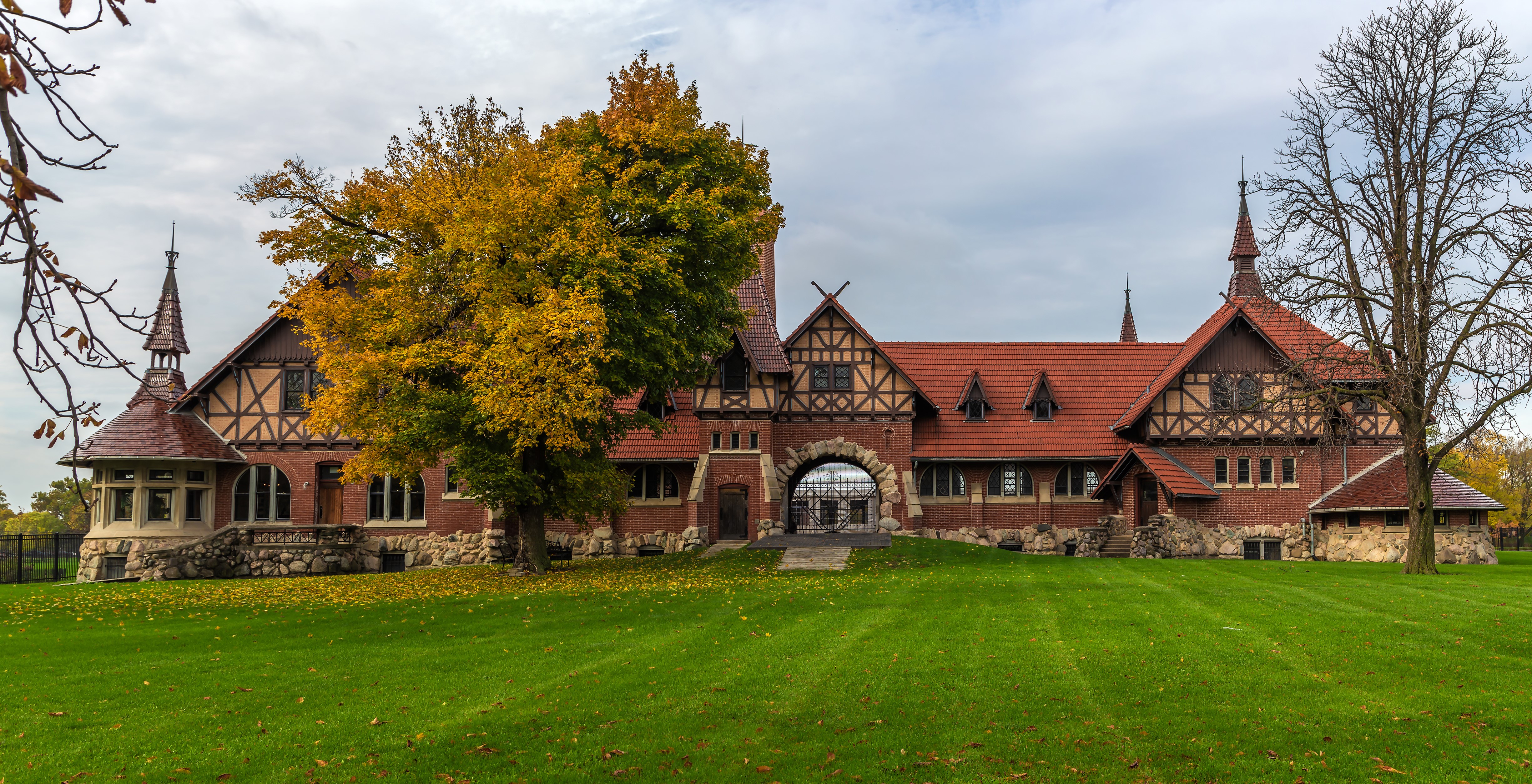 Humboldt Park building with autumn trees HD Wallpaper