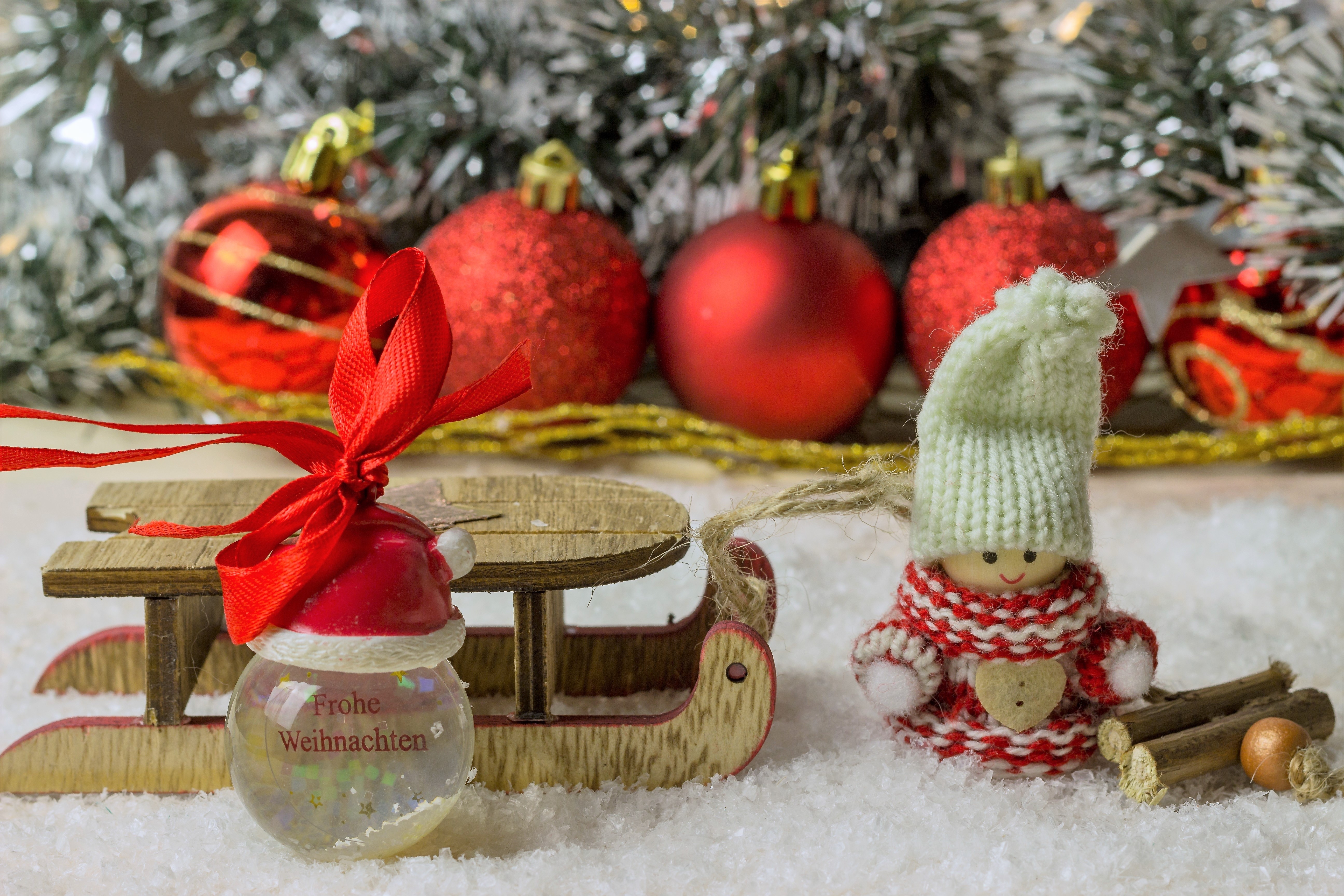 Christmas ornaments and decorations on a sled HD Wallpaper