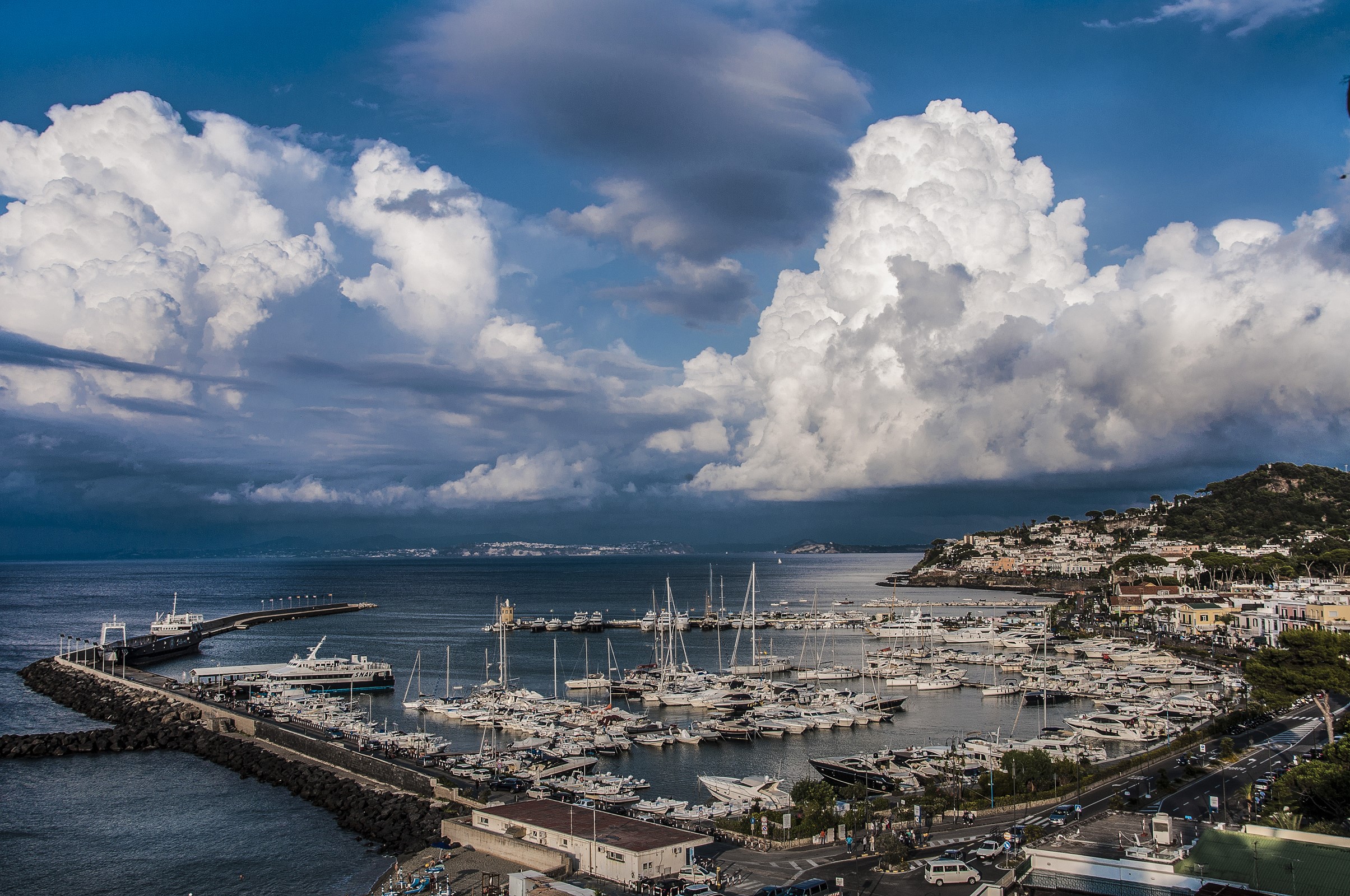 Ischia Port of Casamicciola, Italy with boats and clouds HD Wallpaper