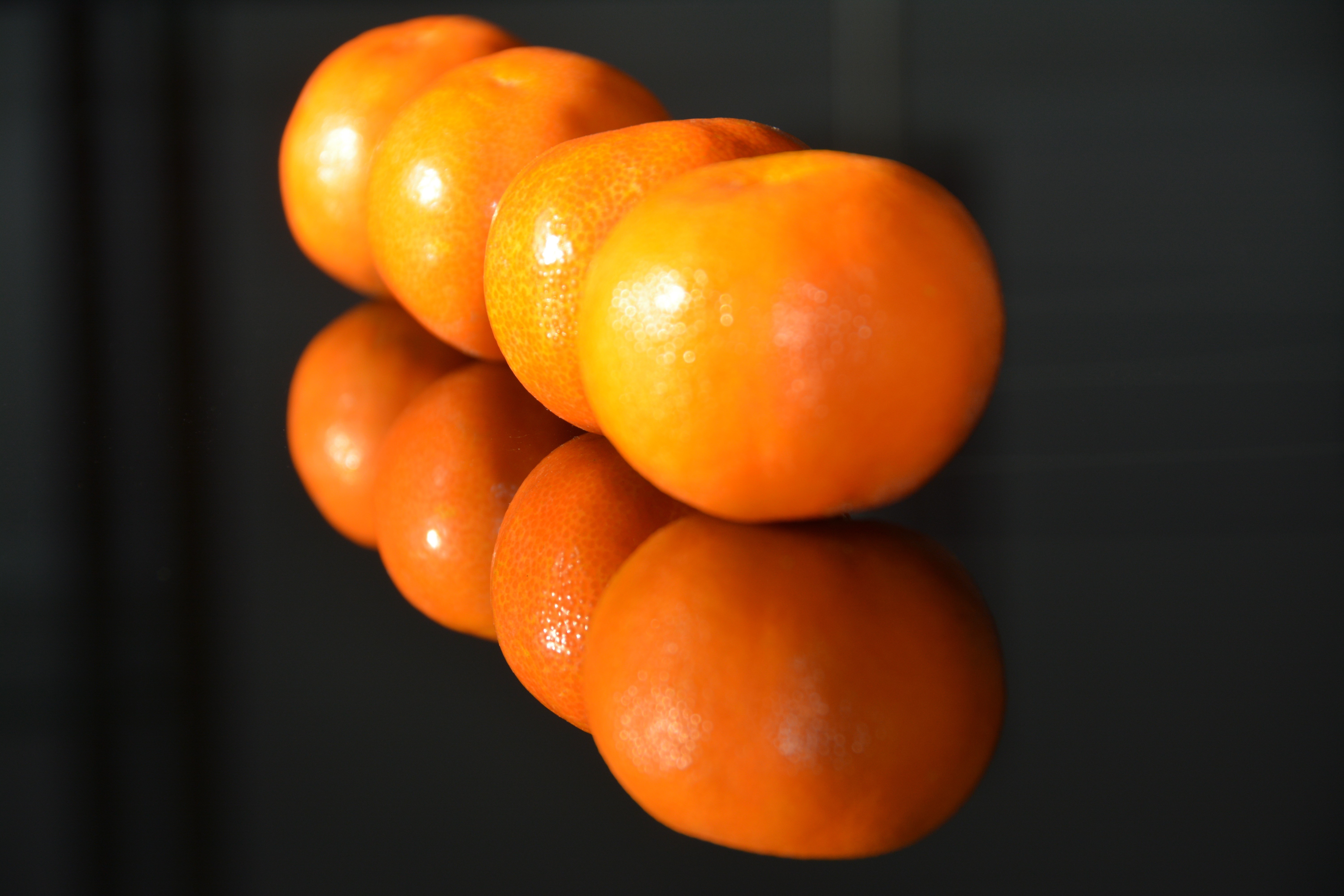 Mandarine closeup with reflection HD Wallpaper