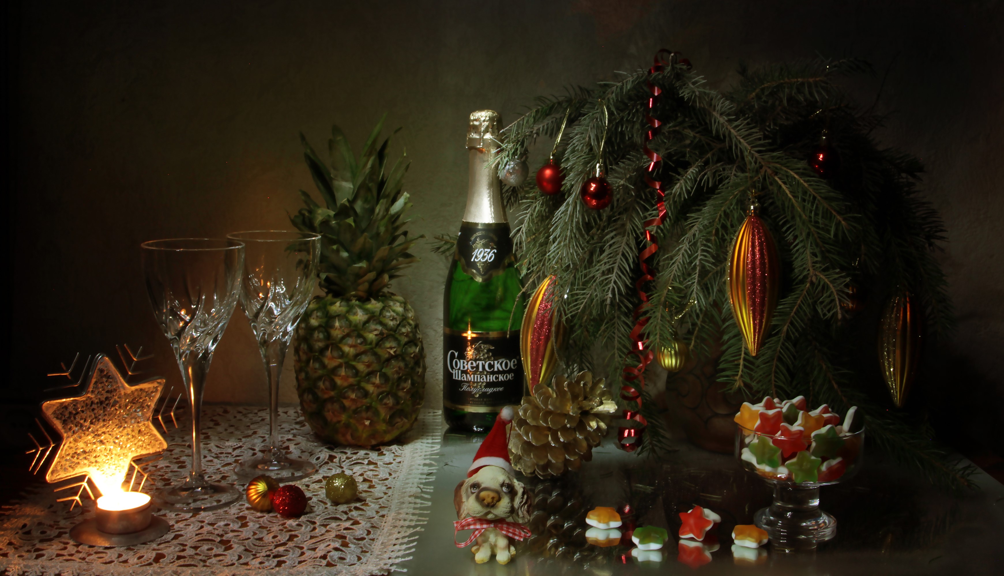 Christmas still life with champagne, pineapple, and tree HD Wallpaper