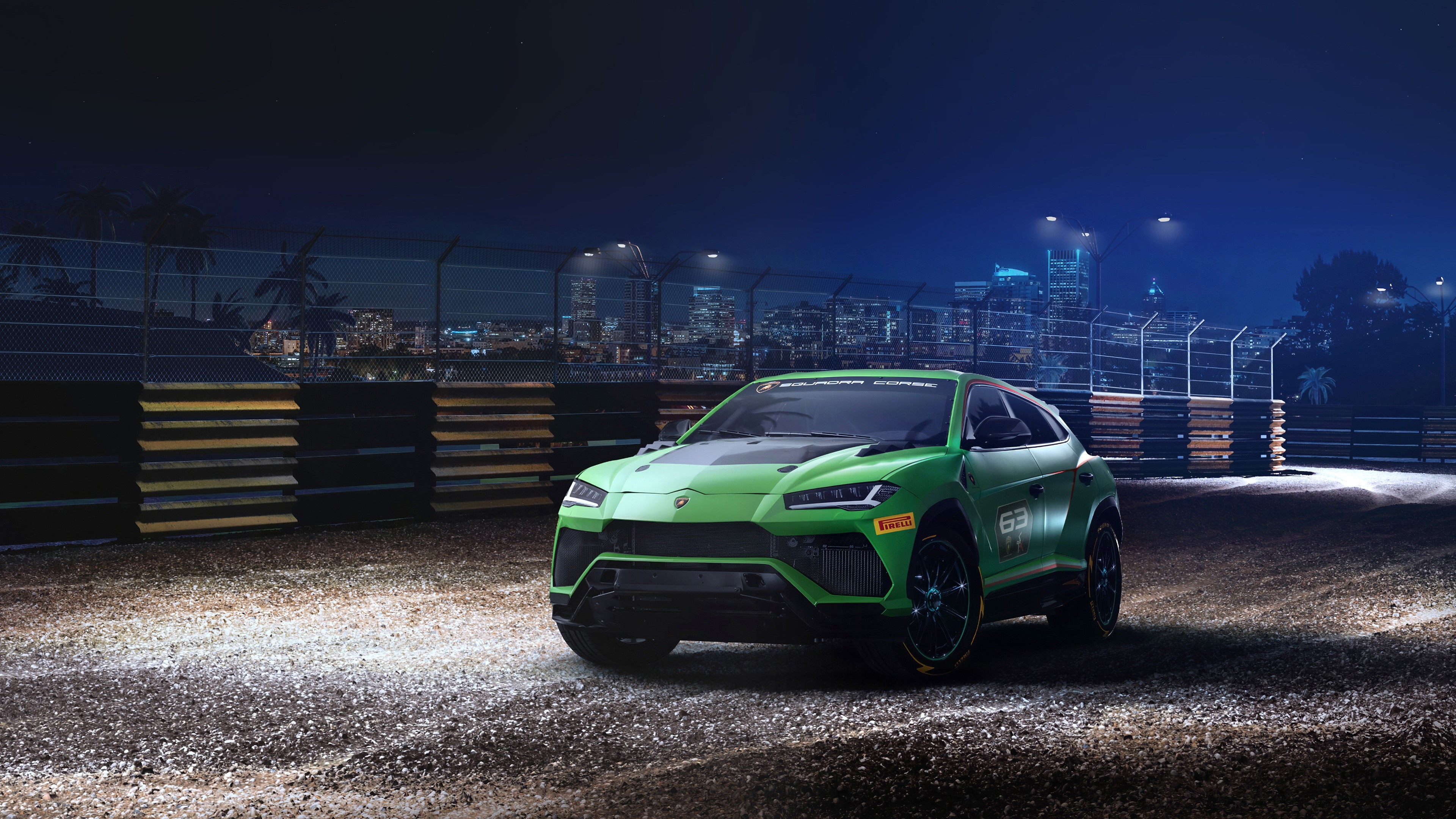 Green Lamborghini Urus ST-X on a Racetrack at Night HD Wallpaper