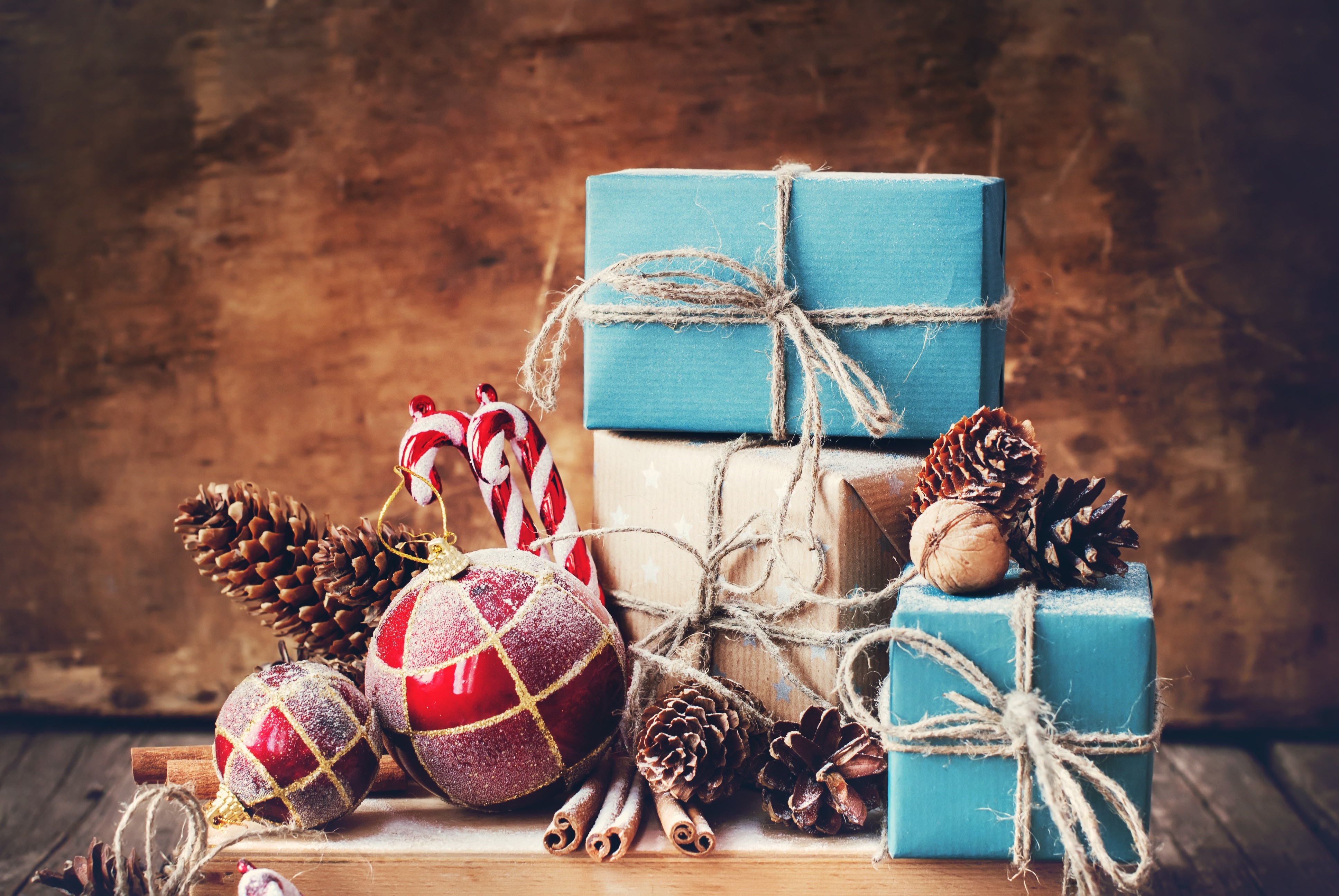 Christmas Gifts with Ornaments and Pinecones HD Wallpaper