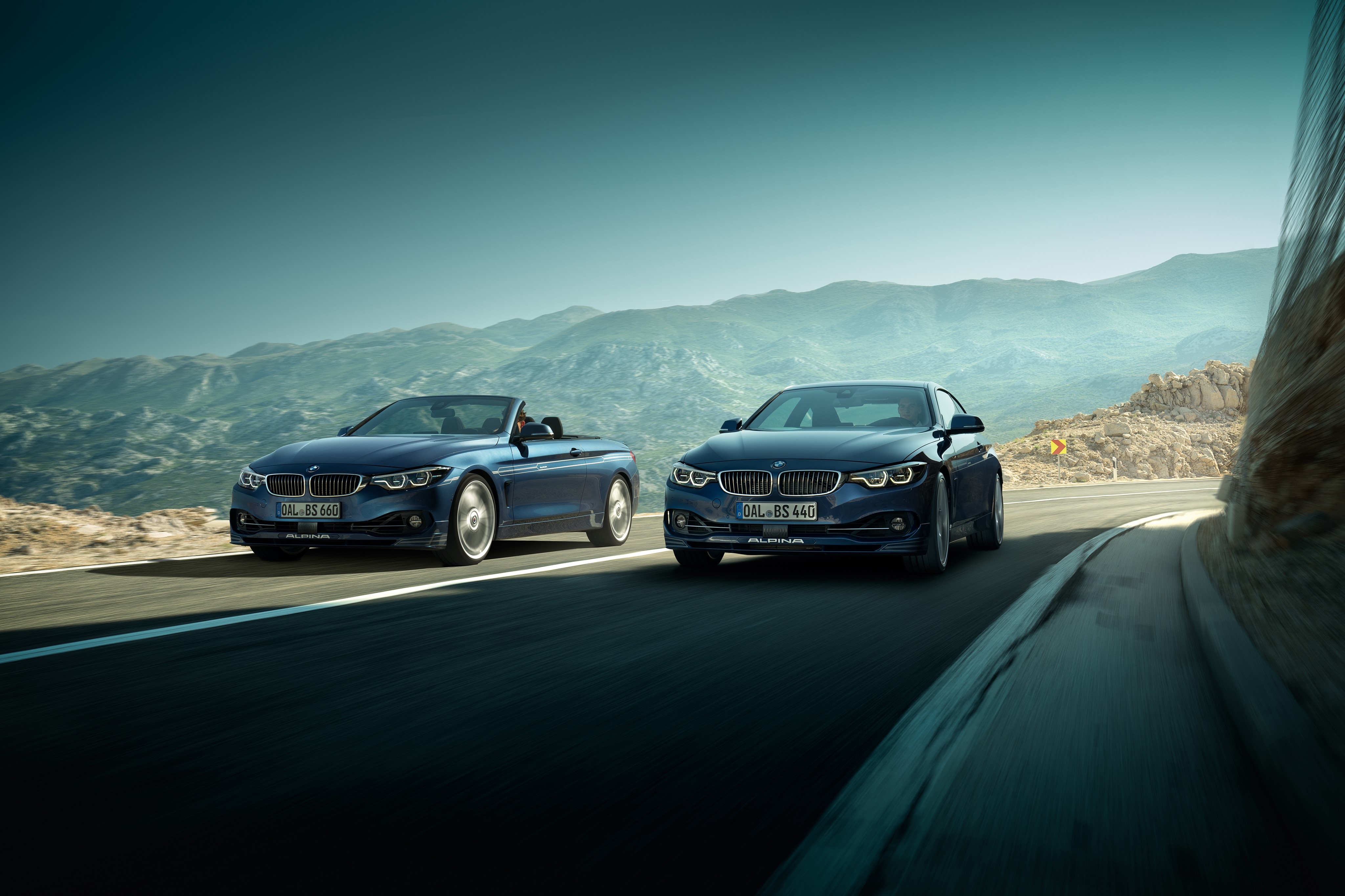 Two 2017 Alpina B4 S Bi-Turbo cars on a road HD Wallpaper