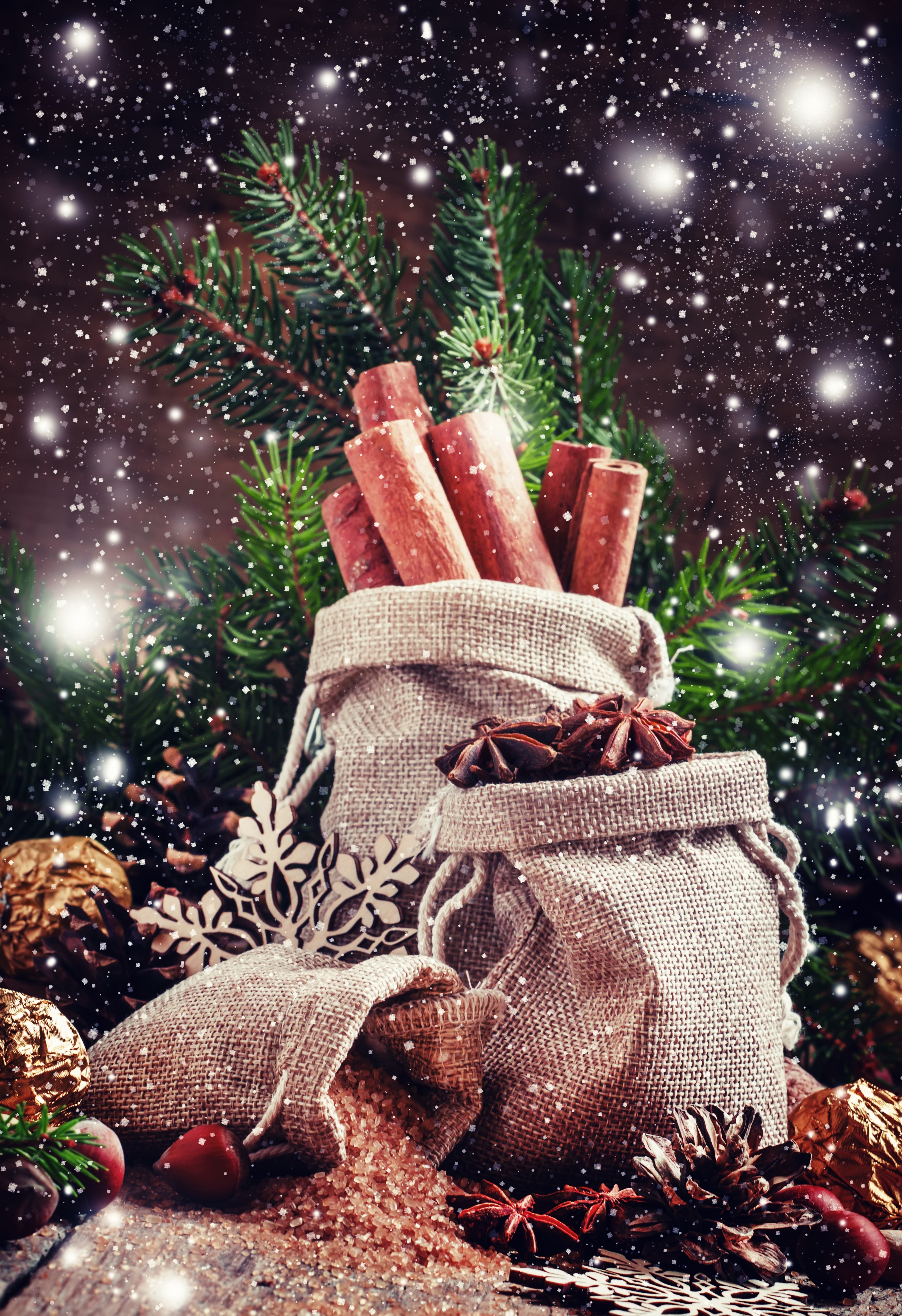 Christmas spices and pine branches with snow HD Phone Wallpaper