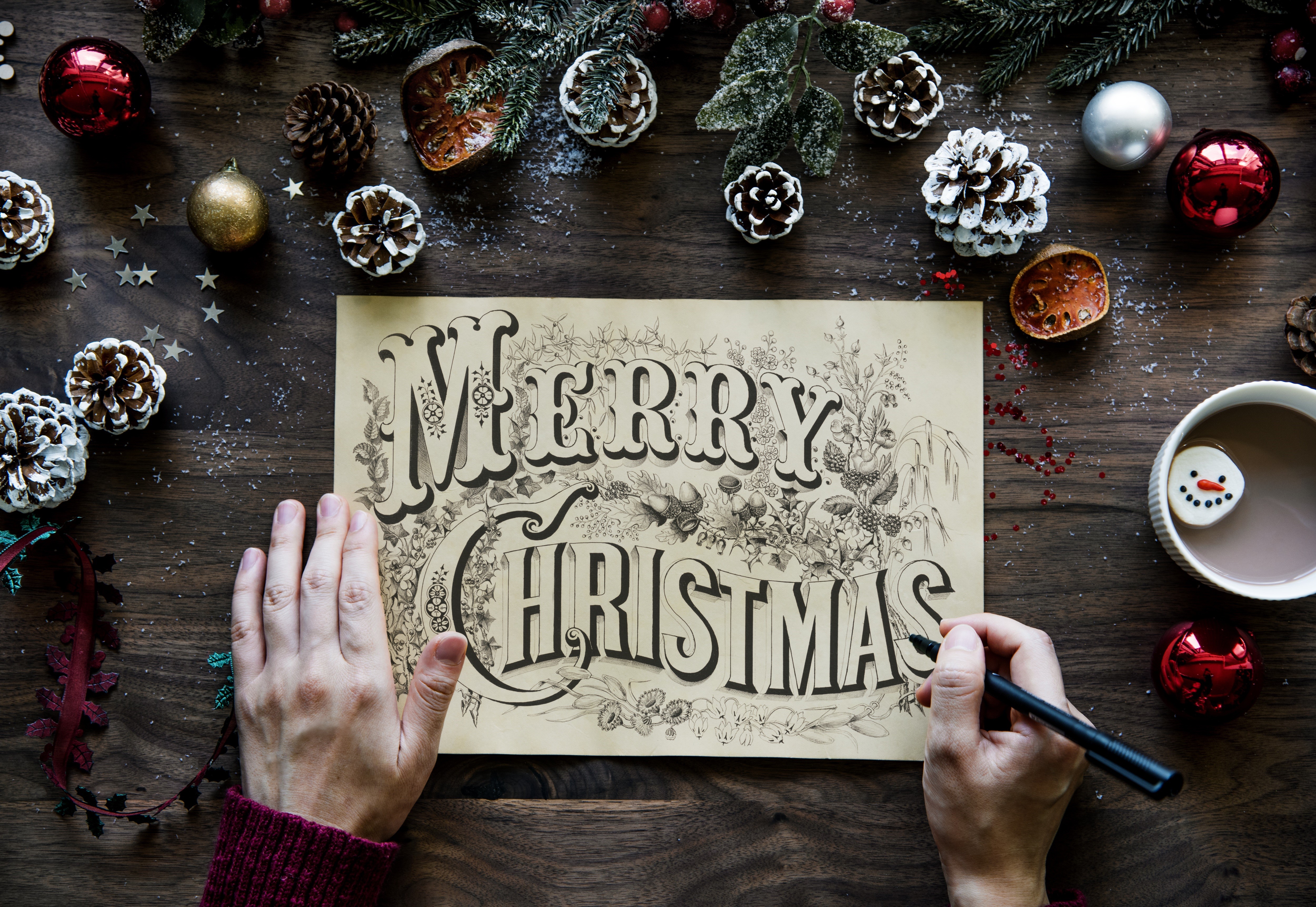 Merry Christmas calligraphy with Christmas decorations HD Wallpaper