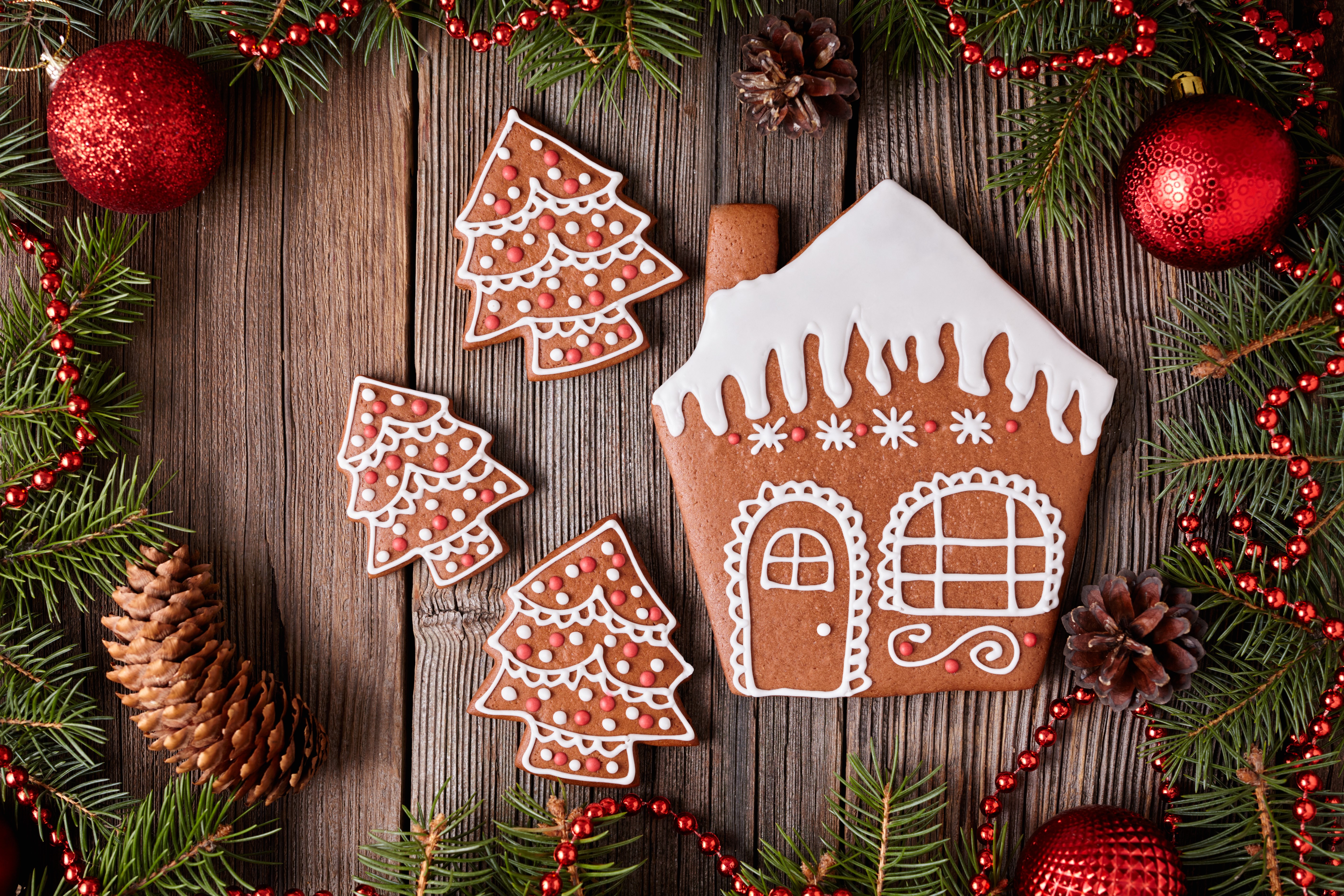 Christmas gingerbread house and trees on wood HD Wallpaper