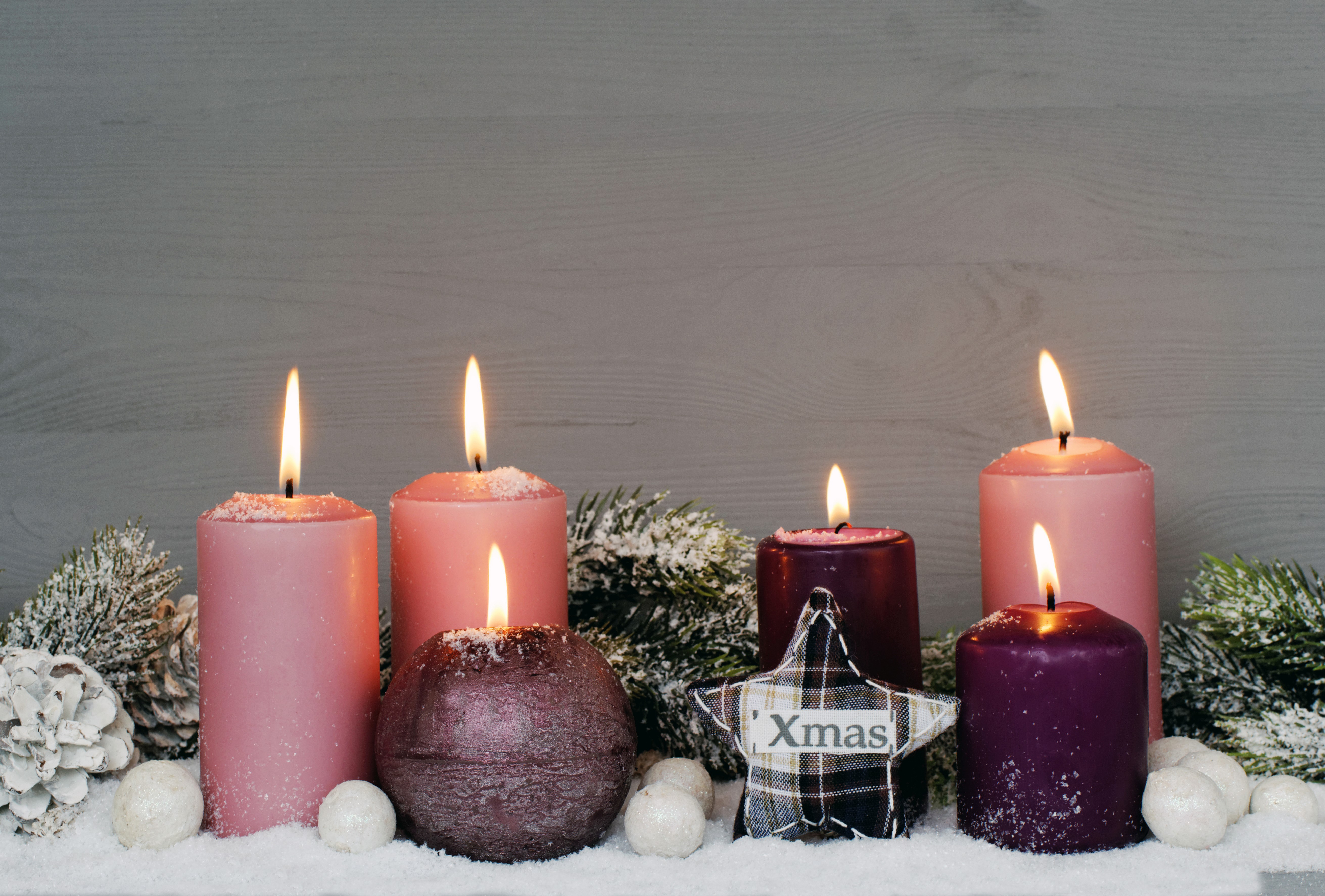 Christmas candles with snow and pine branches HD Wallpaper