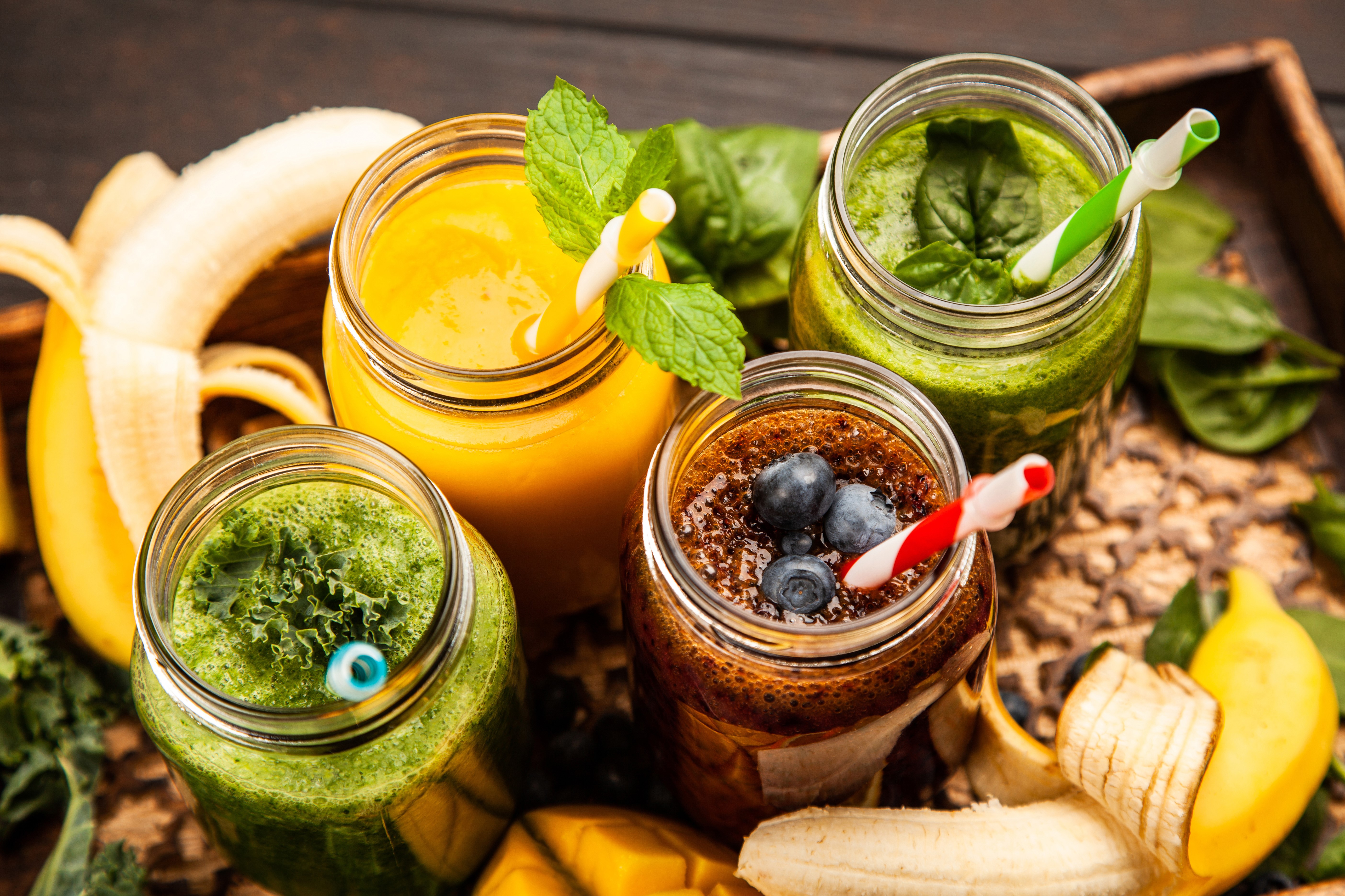 Four smoothies in jars with fruits and vegetables HD Wallpaper