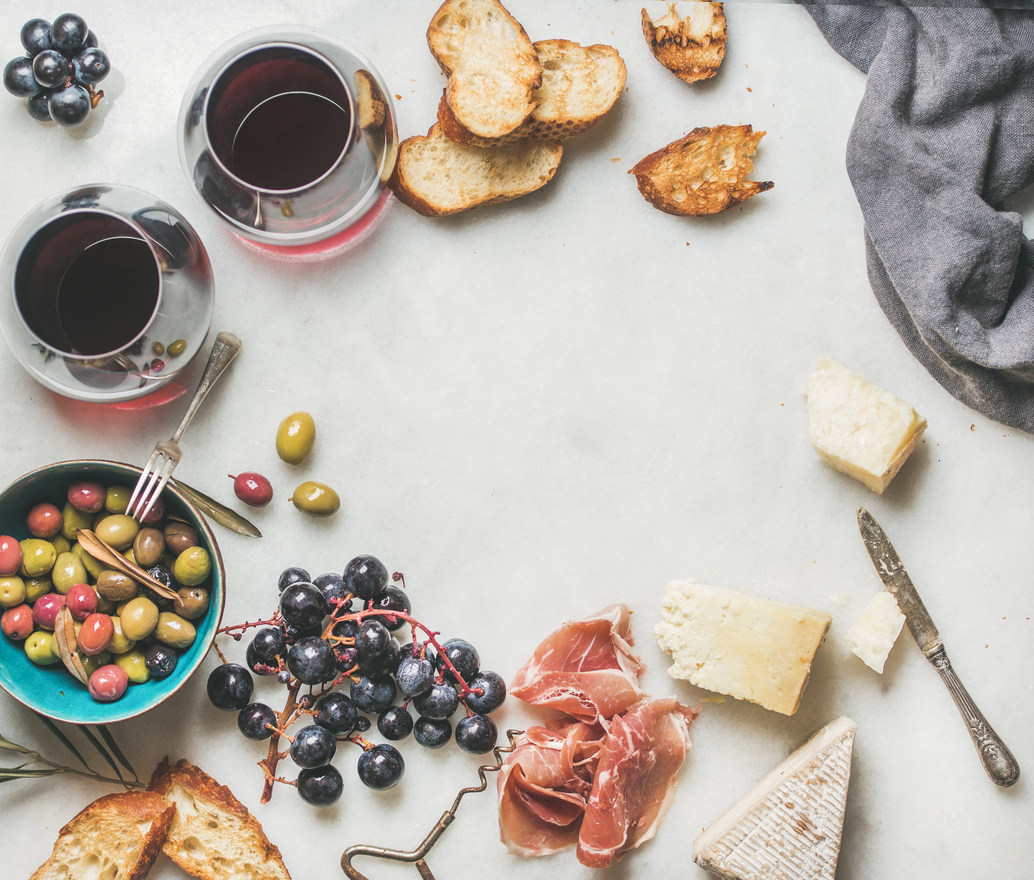 Grapes, Bread, Ham, Cheese, and Olives with Wine HD Wallpaper